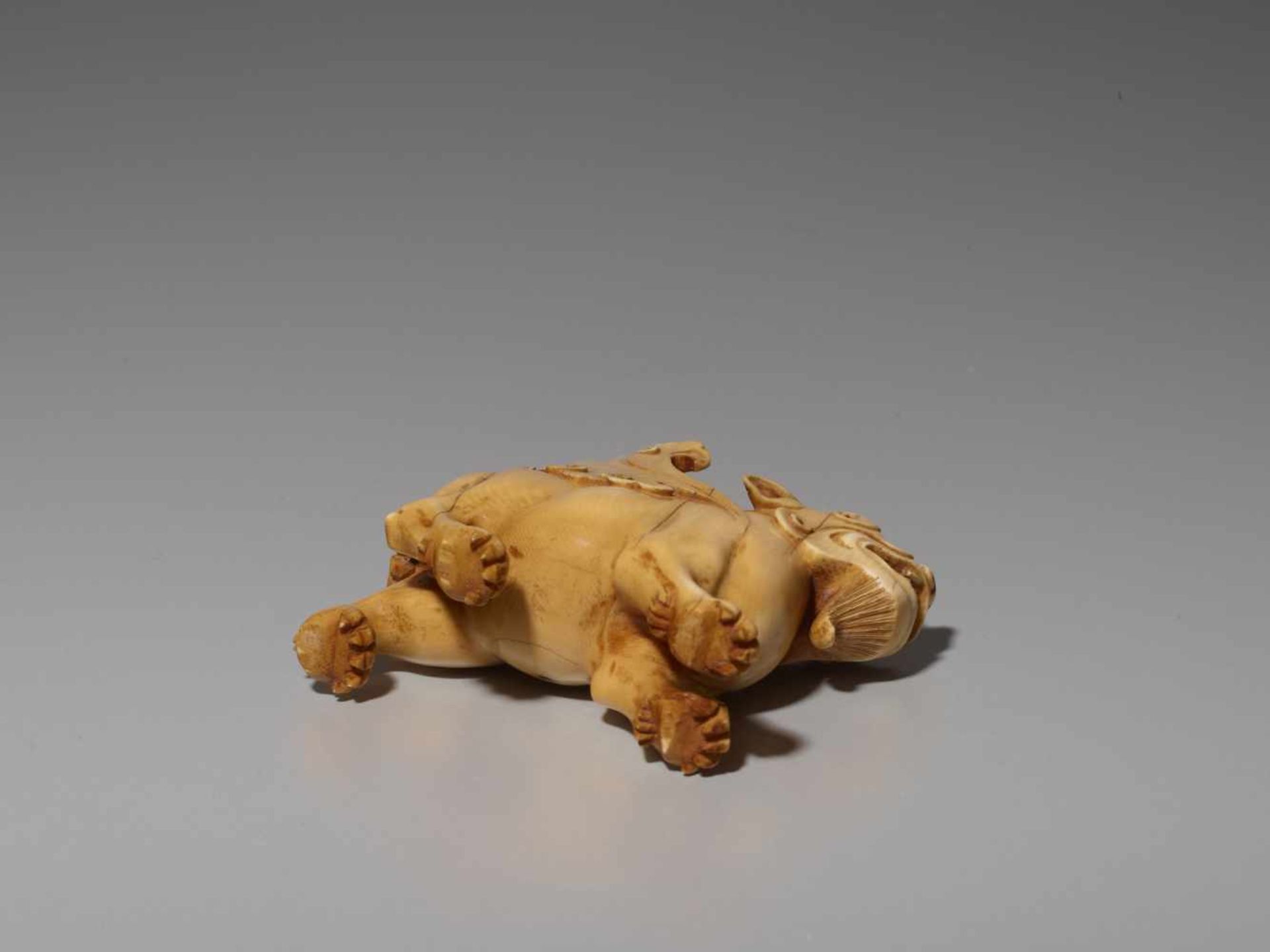 AN IVORY CARVING OF A MYTHICAL BEAST, BIXIE, QING DYNASTY Carved and incised elephant ivory with a - Image 9 of 9