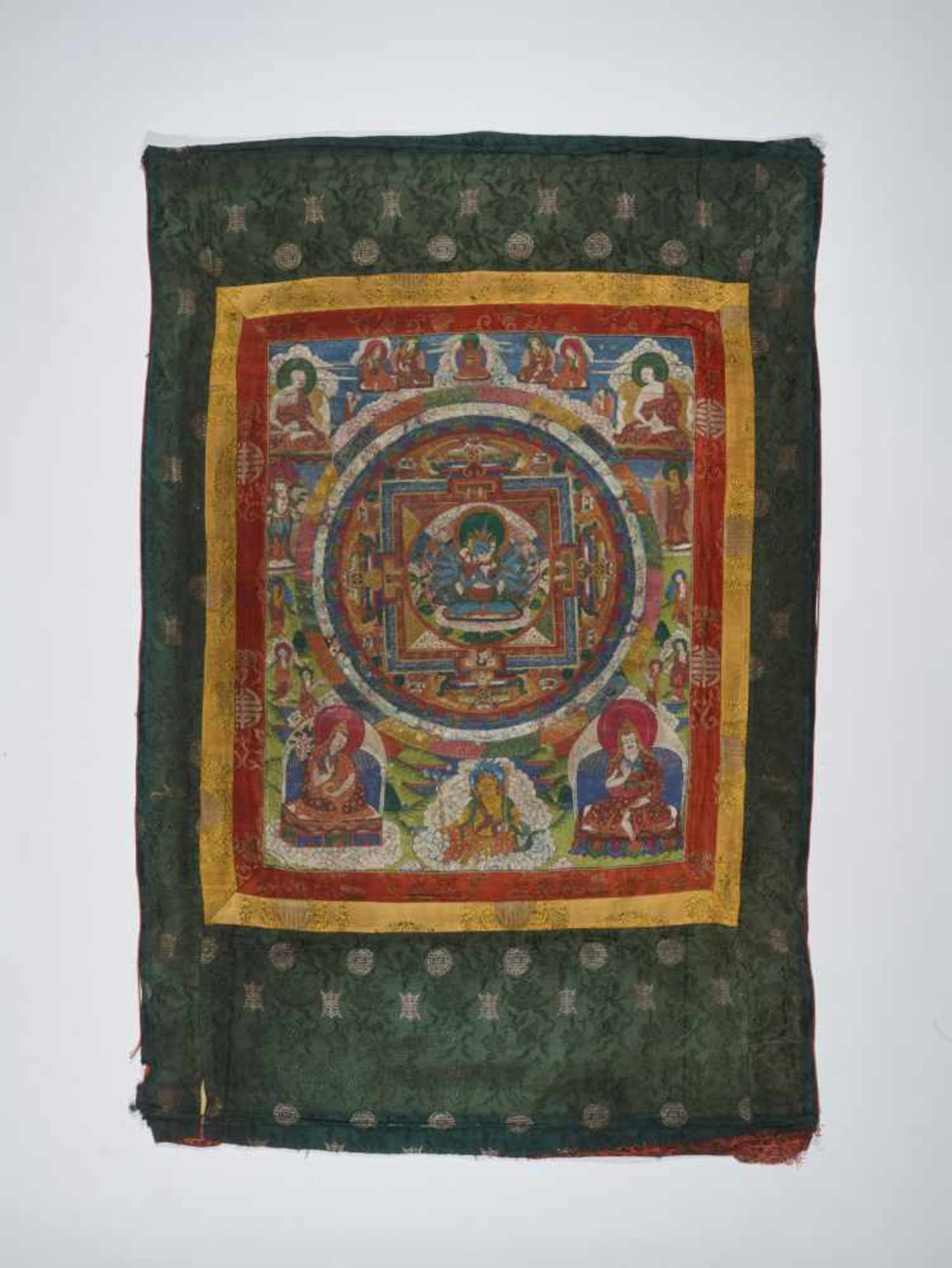 A FIGURE FILLED MANDALA THANGKA WITH CHAKRASAMVARA IN YAB YUM Distemper and gold paint on cloth, - Bild 2 aus 5