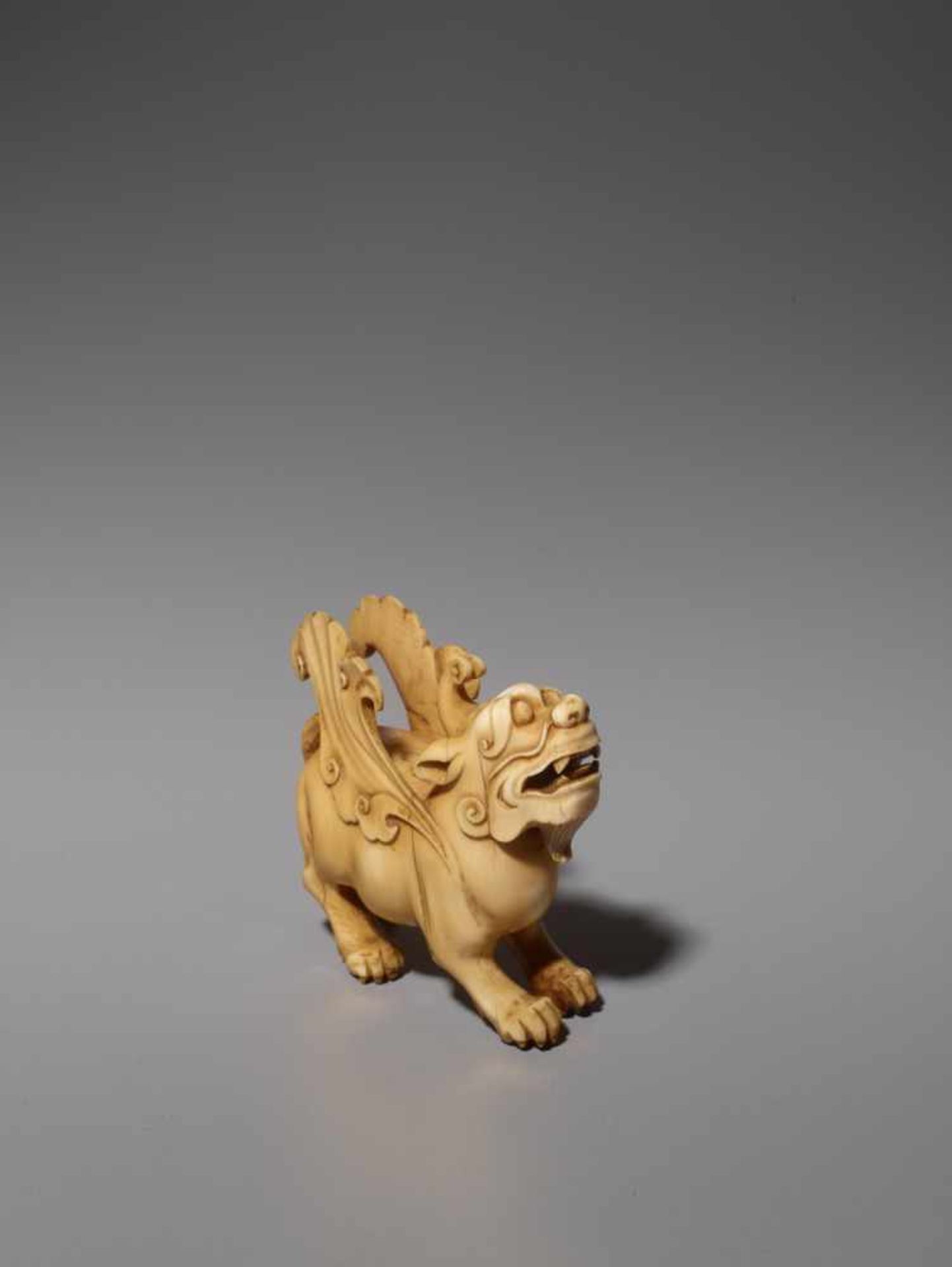 AN IVORY CARVING OF A MYTHICAL BEAST, BIXIE, QING DYNASTY Carved and incised elephant ivory with a - Image 4 of 9