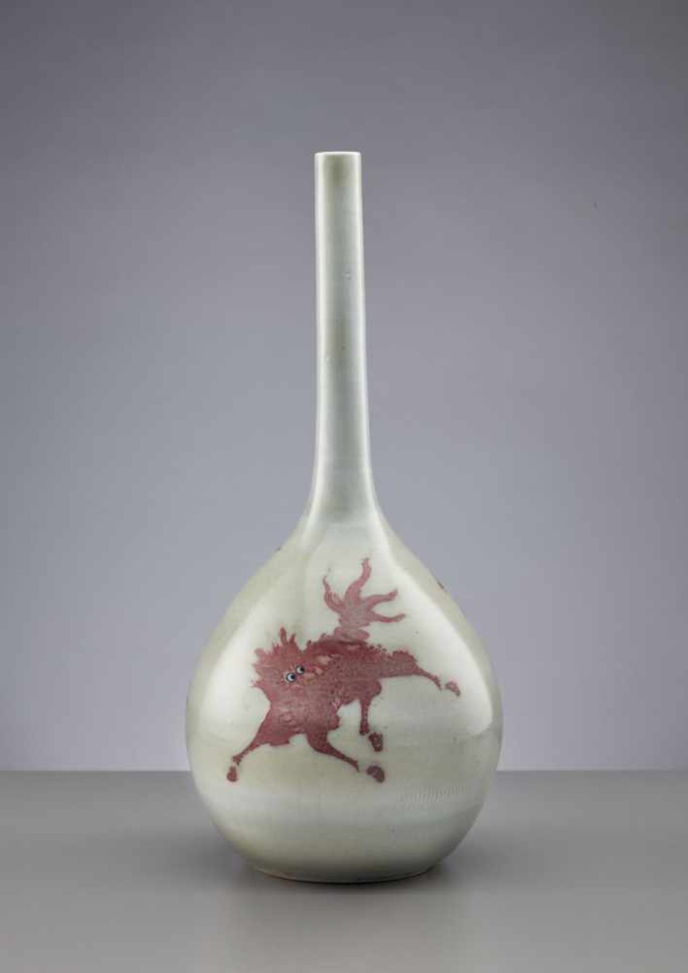 A VERY LARGE UNDERGLAZE COPPER-RED-DECORATED BOTTLE VASE, KANGXI PERIOD (1662-1722) Elegantly potted