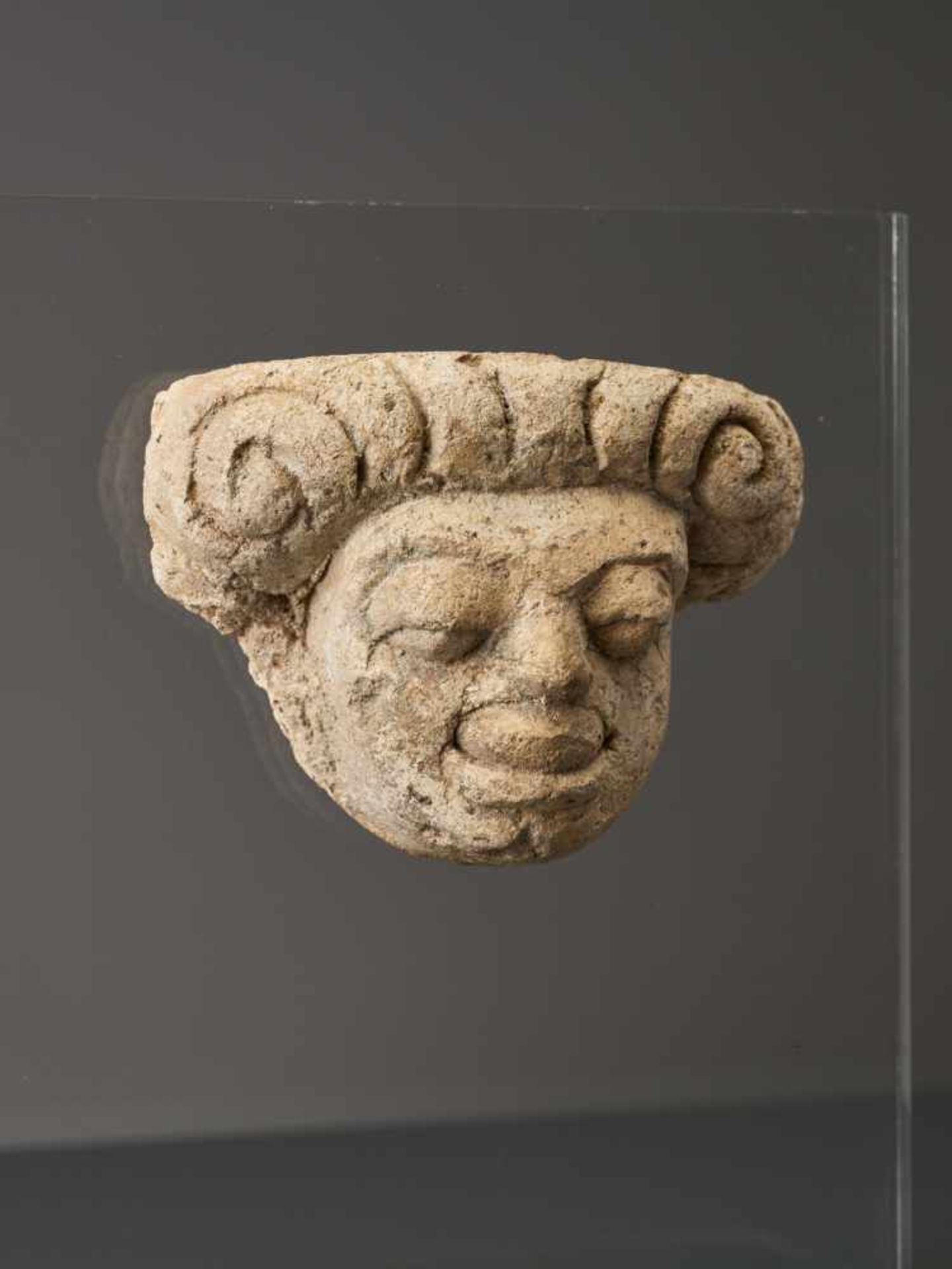 A MON-DVARAVATI STUCCO MASK OF A GROTESQUE MAN, 8th / 9th CENTURY Stucco, firmly mounted to modern - Image 2 of 5