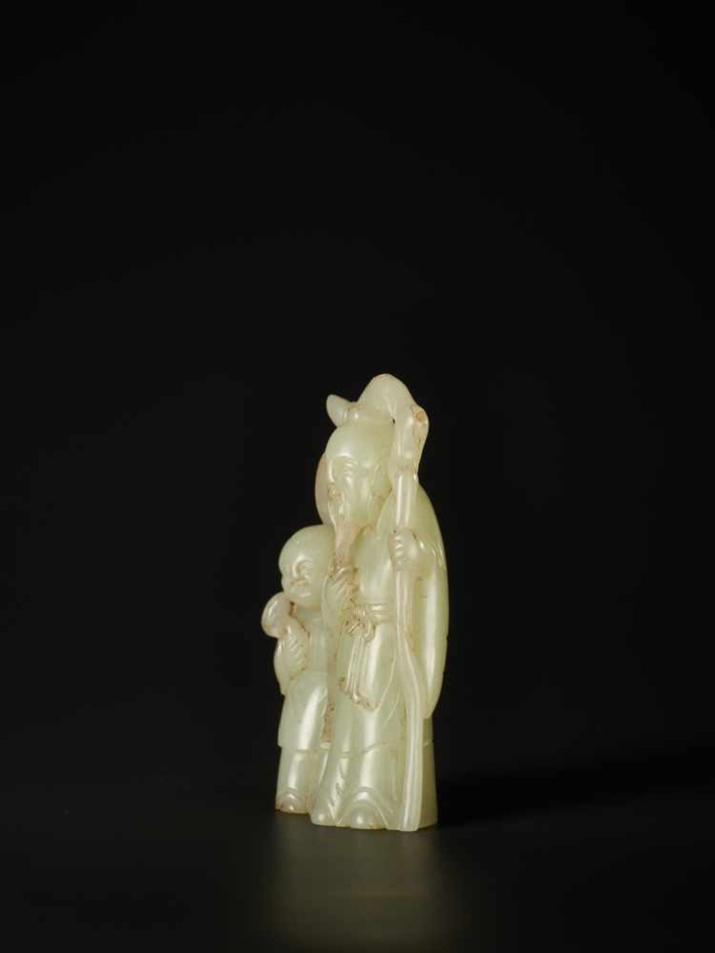 A PALE CELADON CARVING OF ‘LIU HAI AND ZHONGLI QUAN’, QING DYNASTY The jade of pale celadon tone, - Image 3 of 6