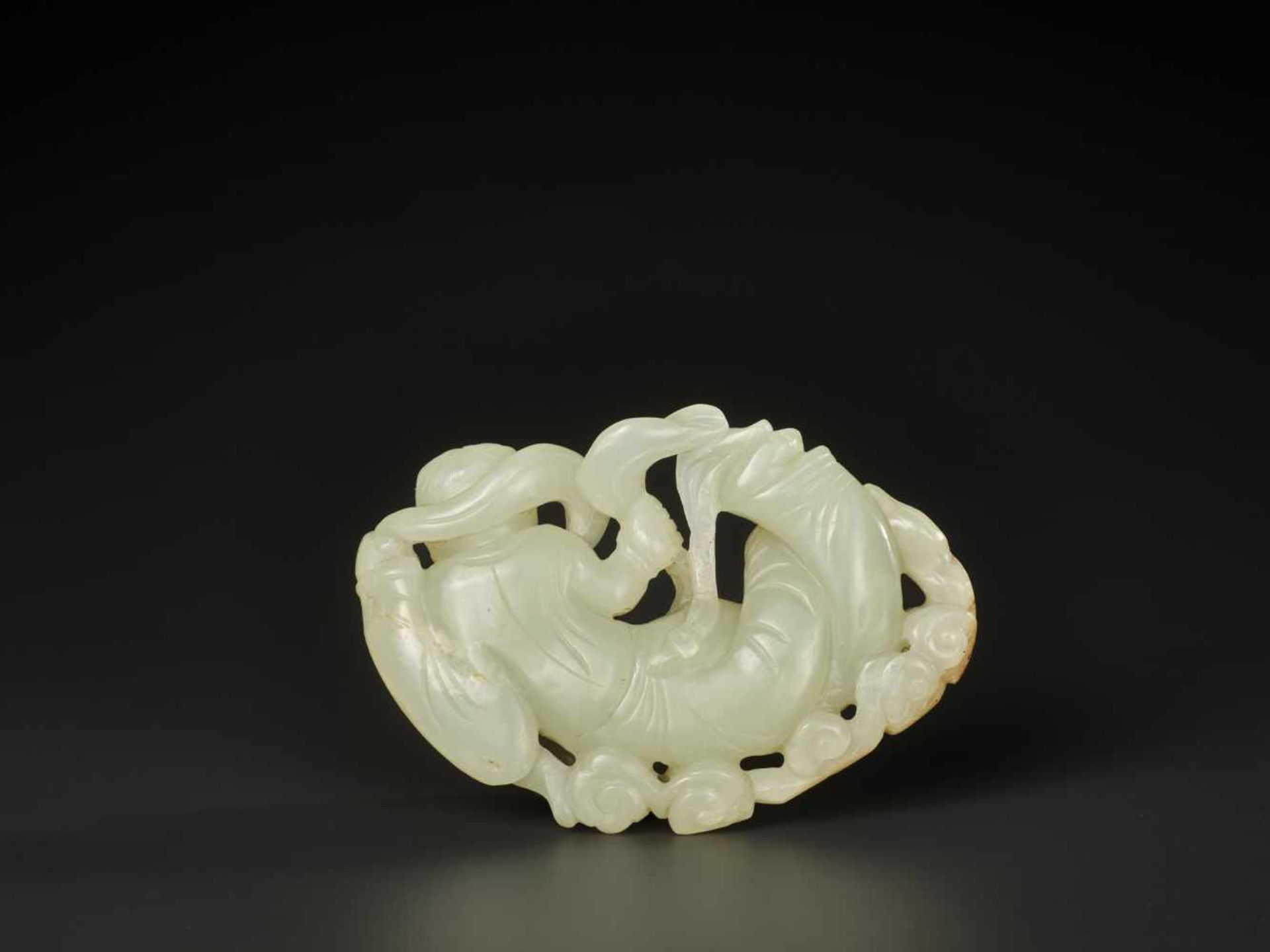 A WHITE JADE CARVING OF AN APSARA, MING DYNASTY OR EARLIER The stone is of an even tone, with a - Image 3 of 8
