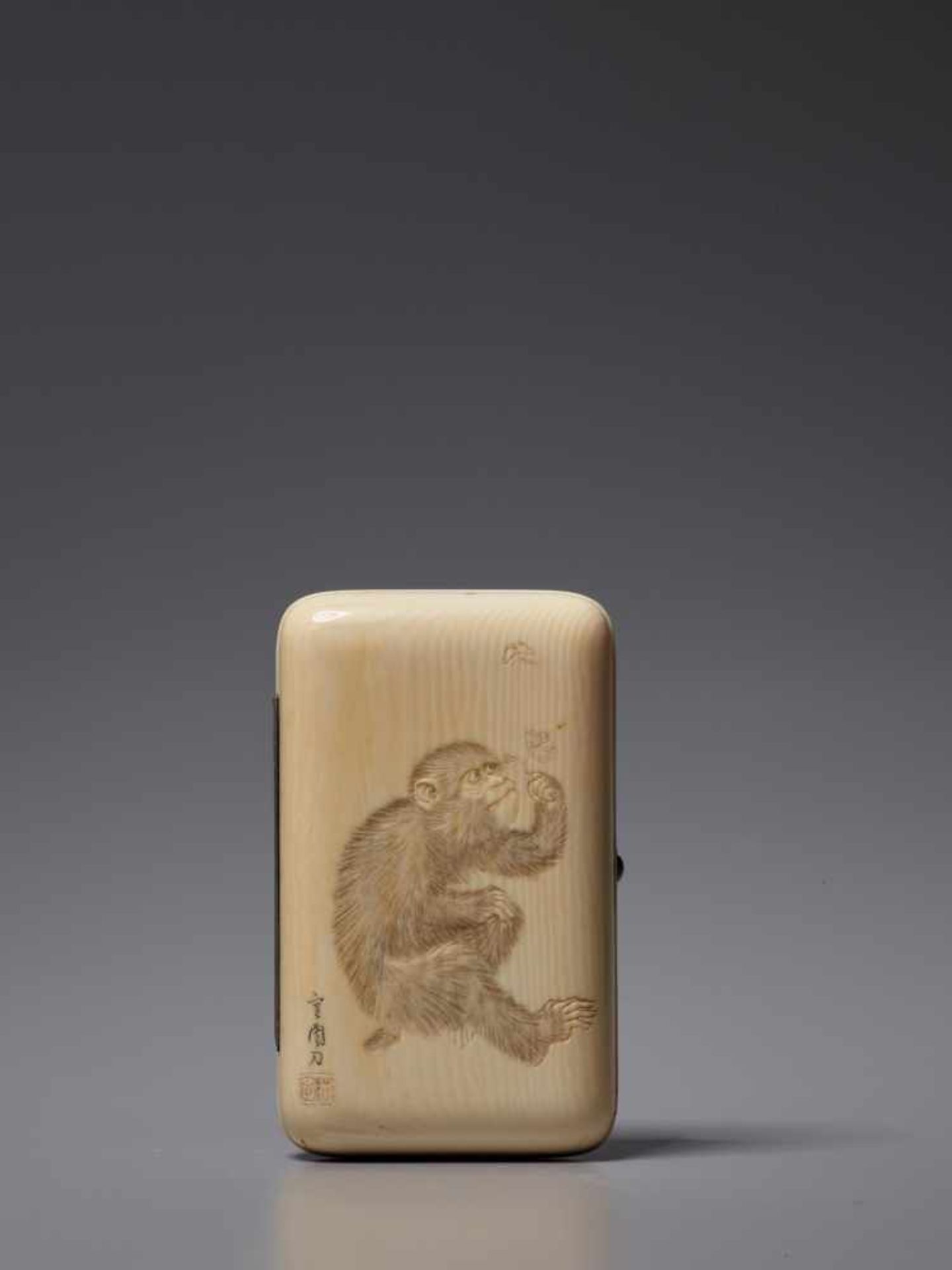 A FINE JAPANESE IVORY CIGARETTE CASE WITH MONKEYS IvoryJapan, Meiji period (1868 - 1912)A