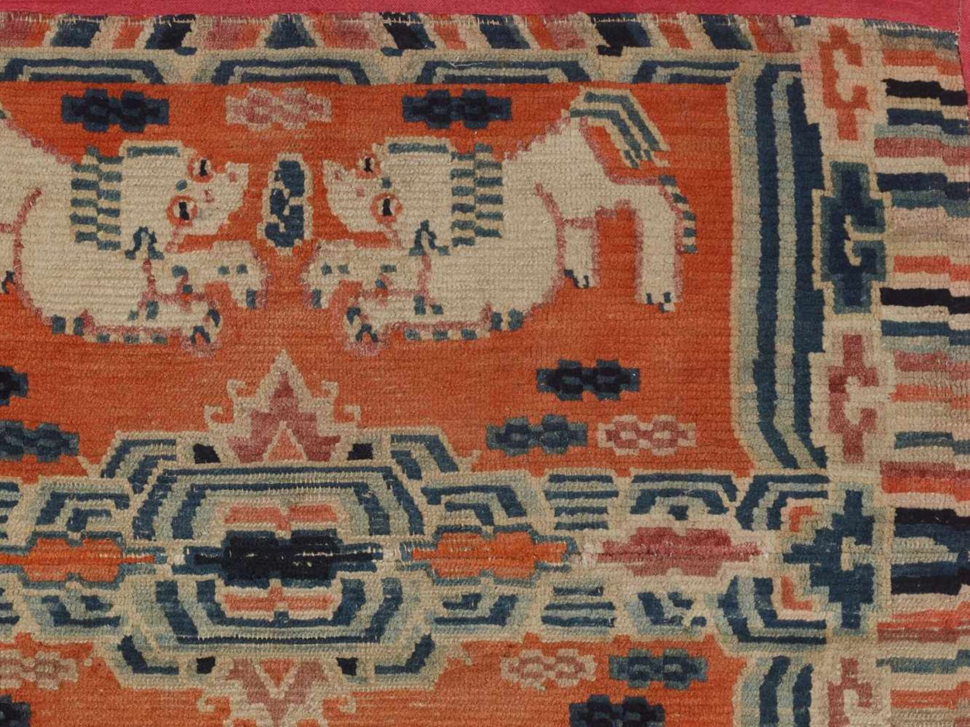 A MAKSHO TIBETAN SADDLE RUG WITH BUDDHIST LIONS, 19th CENTURY Wool and fabric Tibetan, 19th - Image 4 of 5