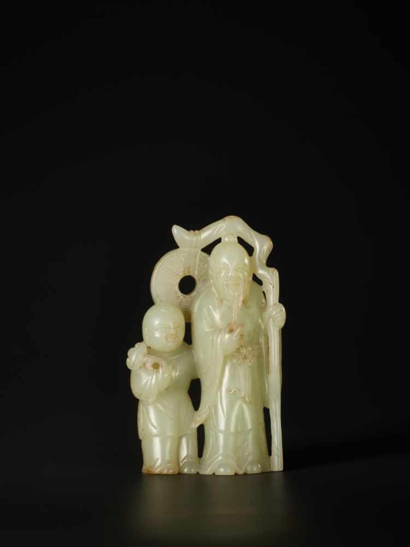 A PALE CELADON CARVING OF ‘LIU HAI AND ZHONGLI QUAN’, QING DYNASTY The jade of pale celadon tone, - Image 5 of 6