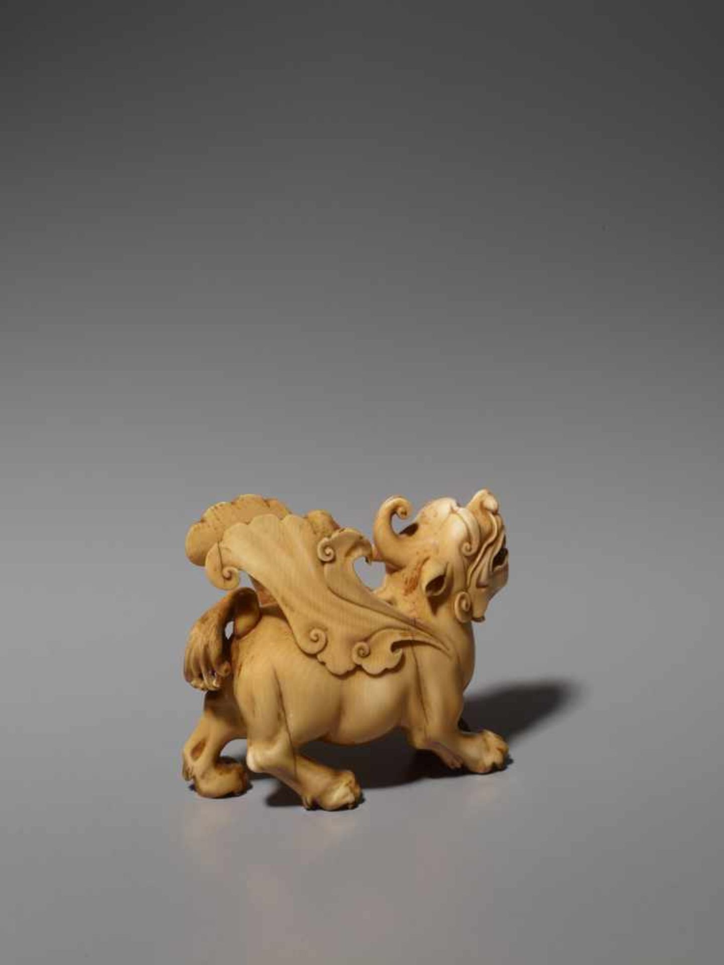 AN IVORY CARVING OF A MYTHICAL BEAST, BIXIE, QING DYNASTY Carved and incised elephant ivory with a - Image 7 of 9