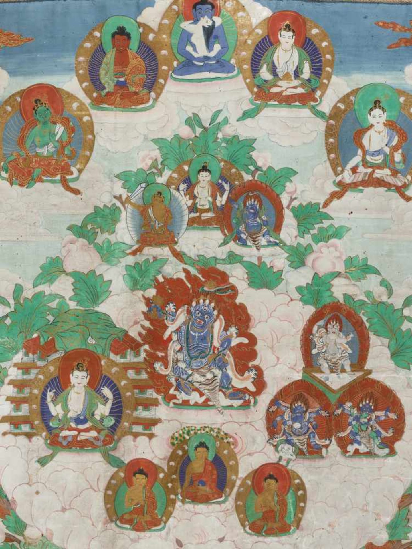 A FINE THANGKA WITH DEITIES IN LOTUS TREE Distemper and gold paint on cloth, framed by segmented - Image 3 of 7