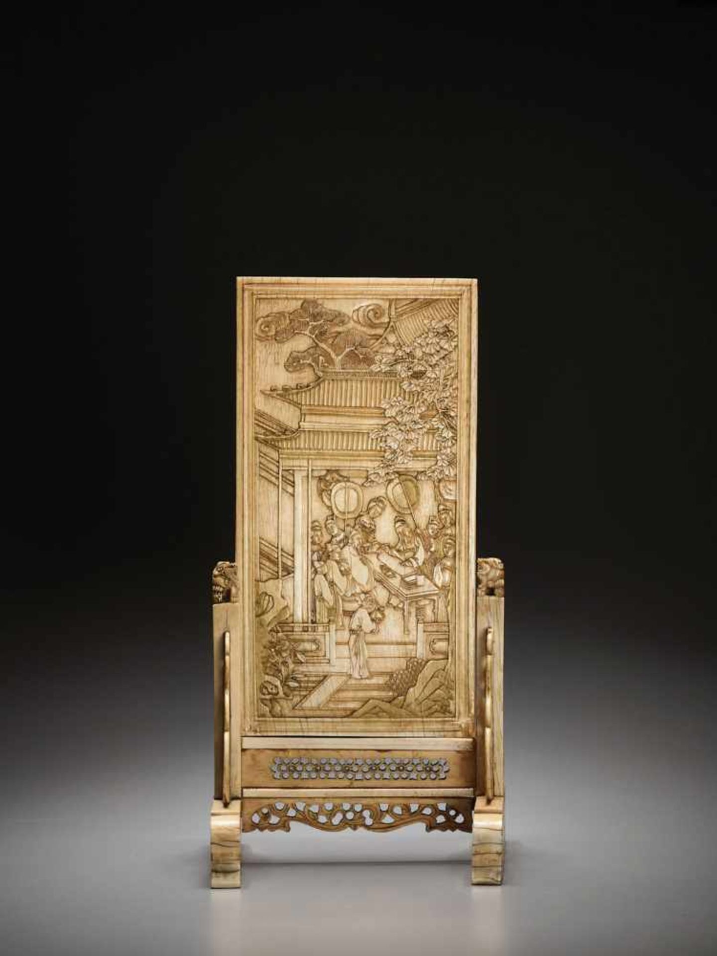 AN IVORY DOUBLE-SIDED ‘PRACTICING CALLIGRAPHY’ TABLE SCREEN, KANGXI Artist signature on the stand.