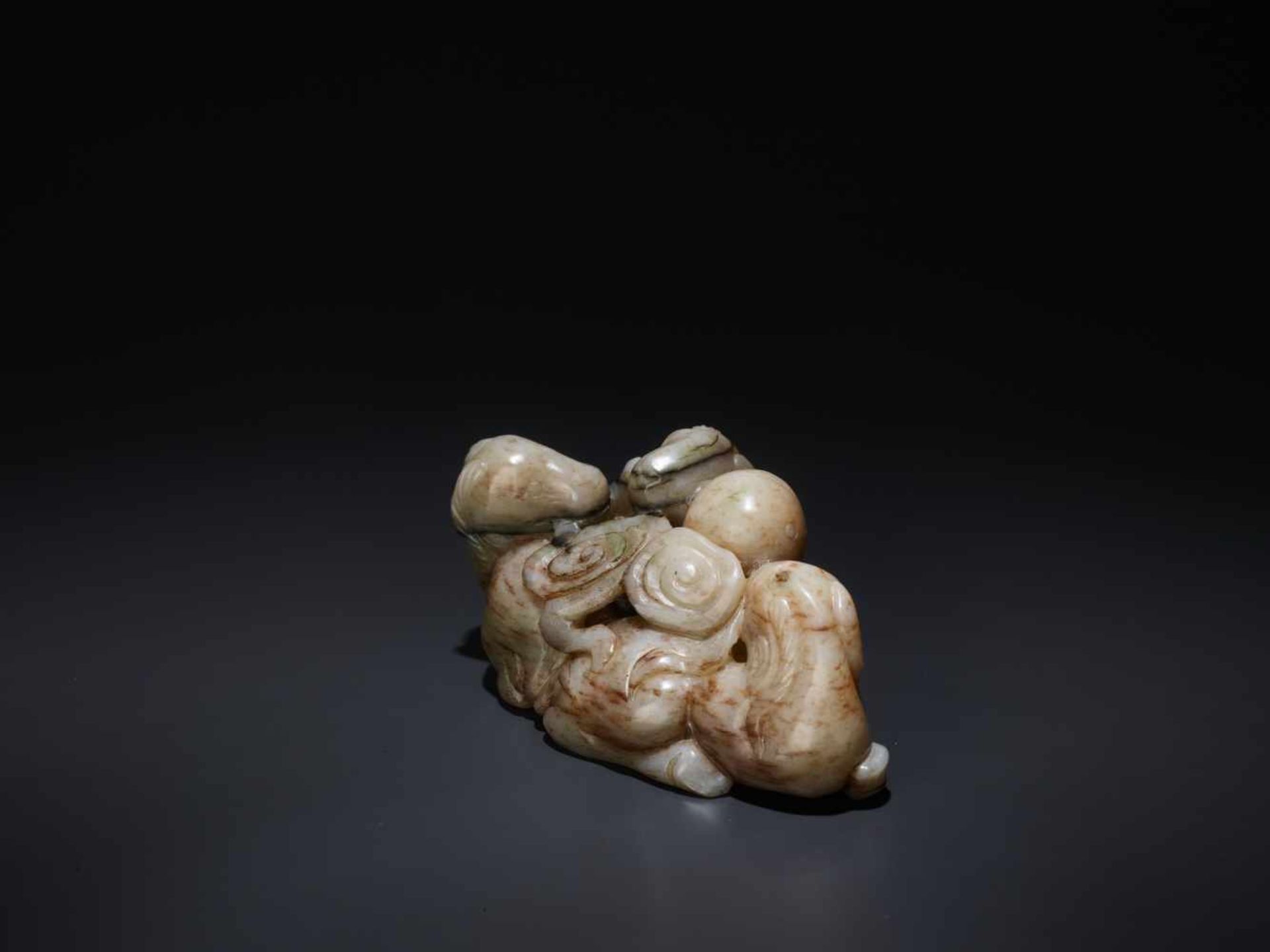 A CHICKEN BONE ‘SAN YANG’ THREE RAMS JADE GROUP, 17TH CENTURY The greyish-white nephrite suffused - Image 4 of 8