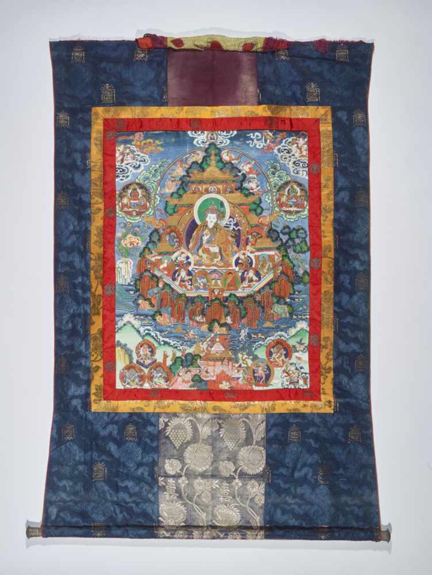 A MAGNIFICENT THANGKA OF GURU RINPOCHE IN ZANGDOK PALRI Distemper and gold paint on cloth, framed by - Image 5 of 7