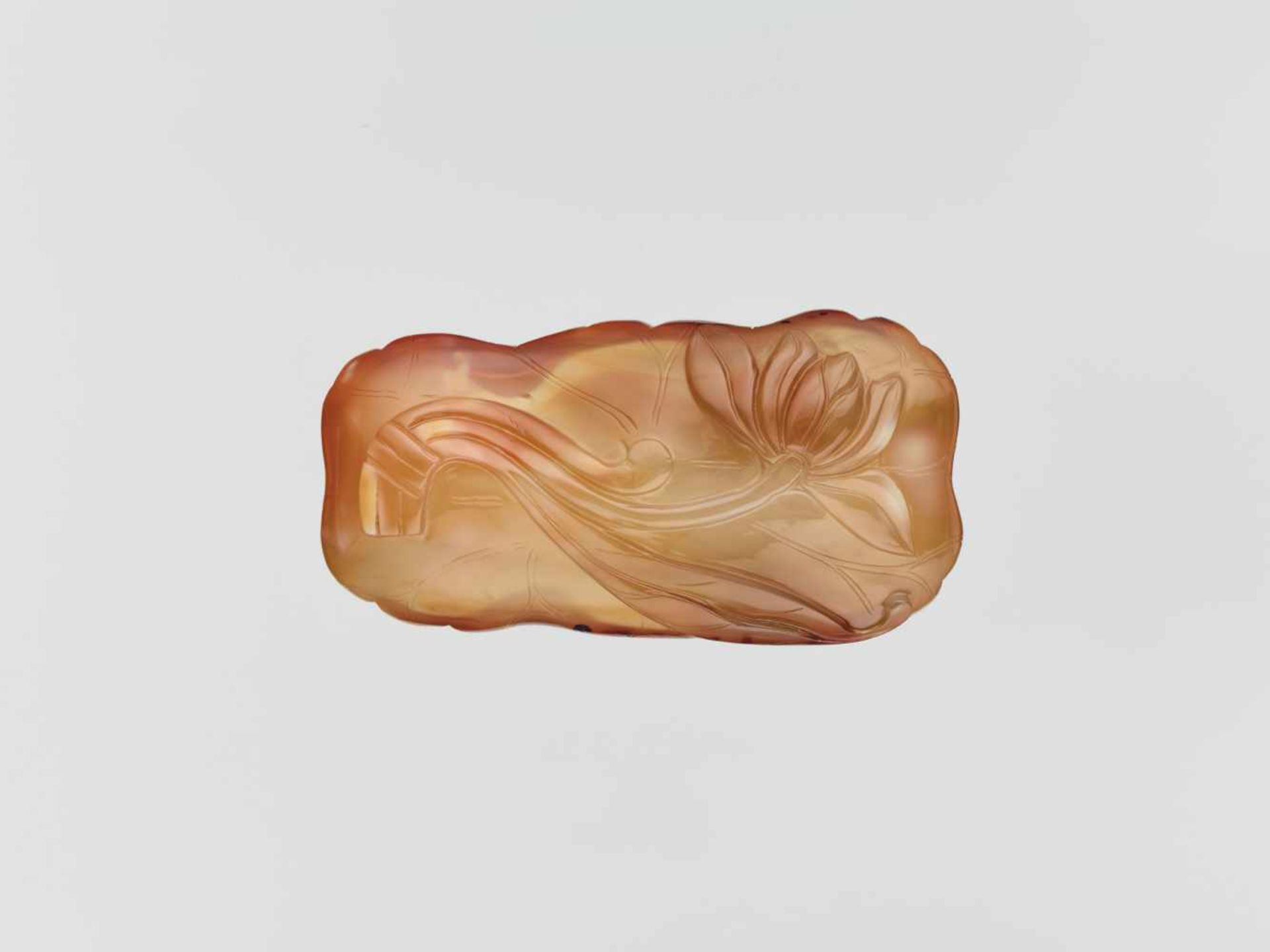 A CARVED AGATE ‘LOTUS’ WASHER QING DYNASTY, 18TH CENTURY Translucent agate of golden-brown and amber - Image 3 of 6