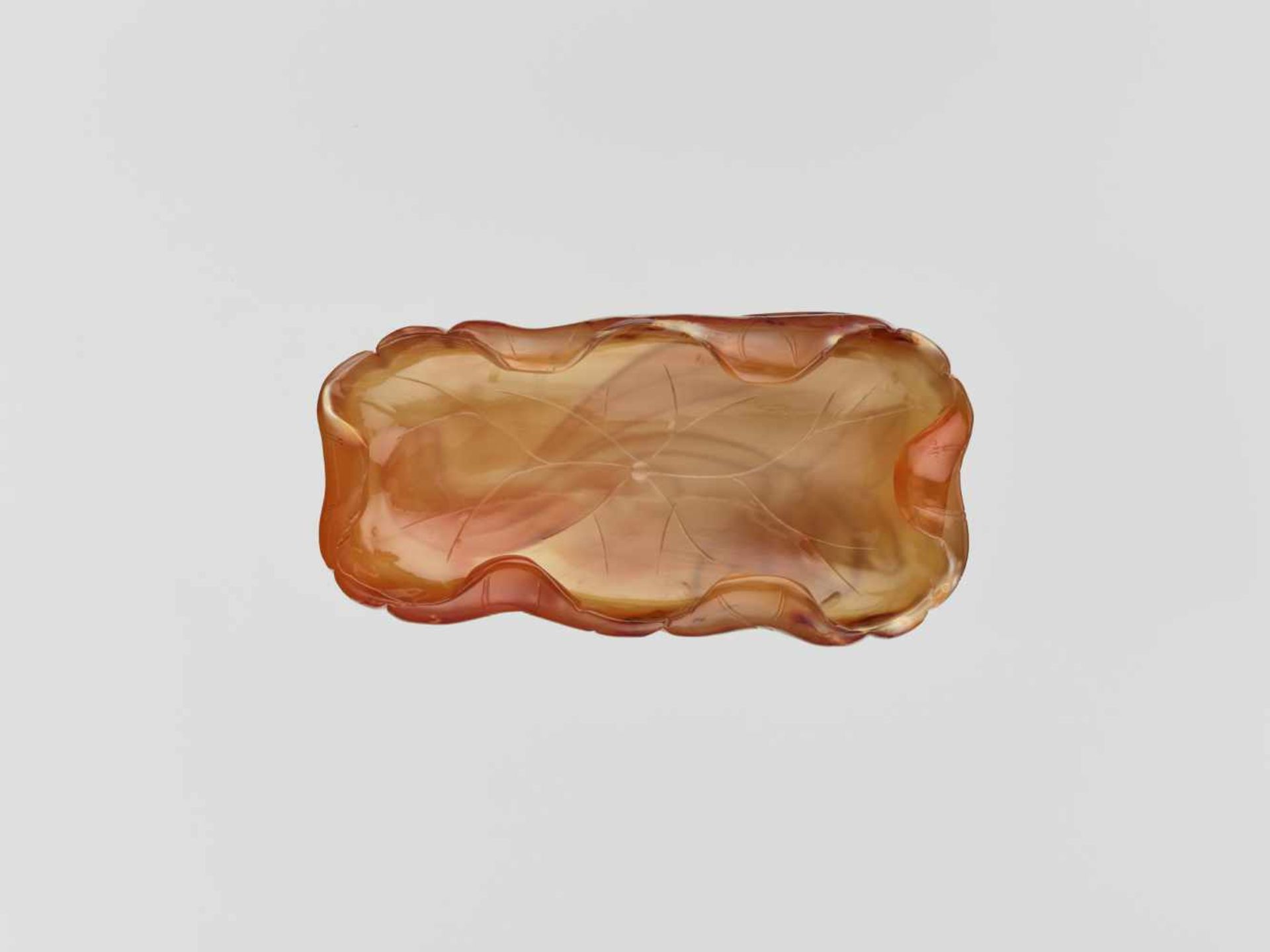 A CARVED AGATE ‘LOTUS’ WASHER QING DYNASTY, 18TH CENTURY Translucent agate of golden-brown and amber - Image 5 of 6