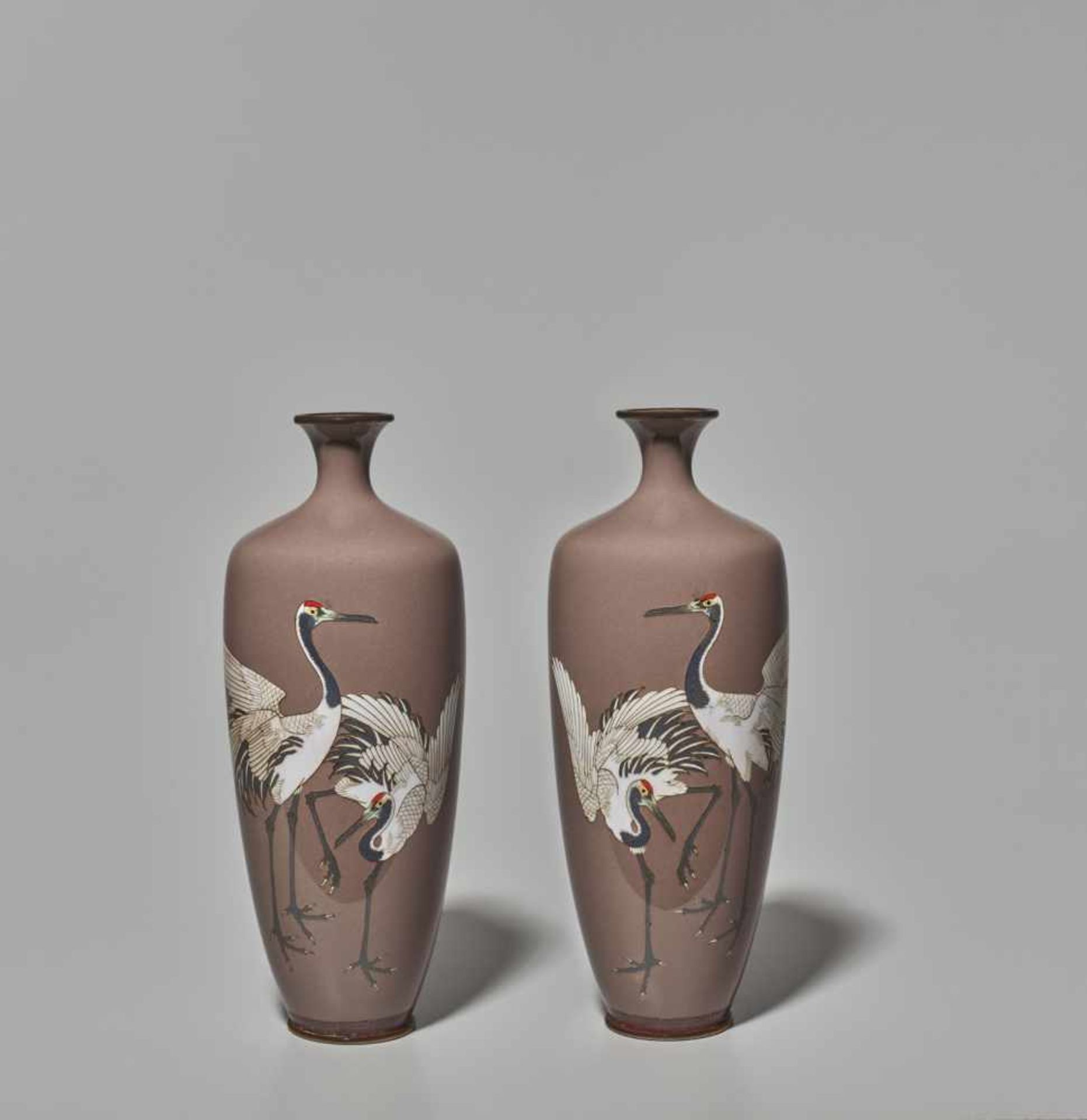 A PAIR OF JAPANESE CLOISONNÉ VASES WITH RED CROWNED CRANES Cloisonné with colored enamelsJapan,