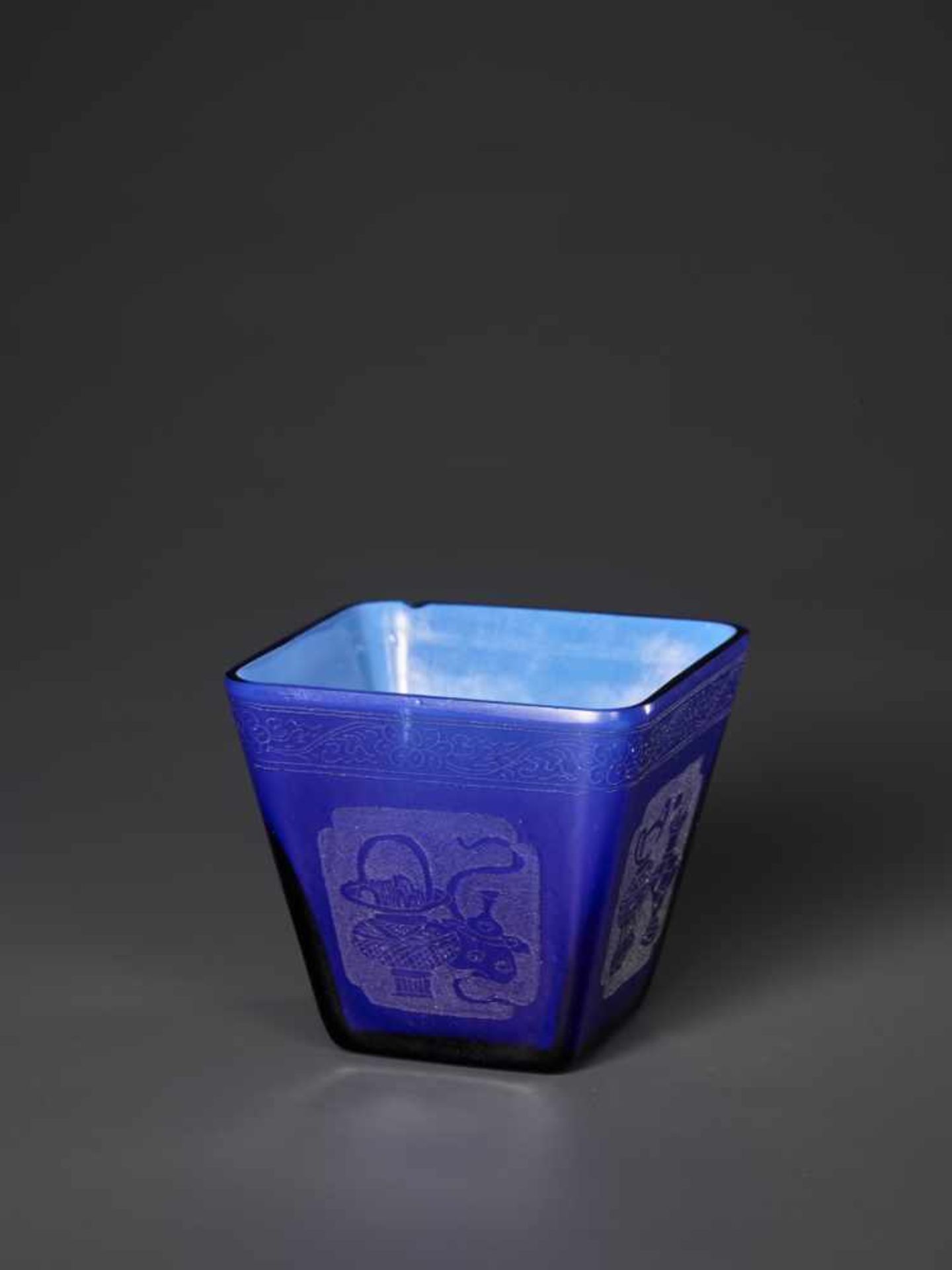 AN ETCHED AND DIAMOND-ENGRAVED SAPPHIRE-BLUE OVERLAY GLASS CUP, KANGXI, 1696-1715 The square- - Image 2 of 7