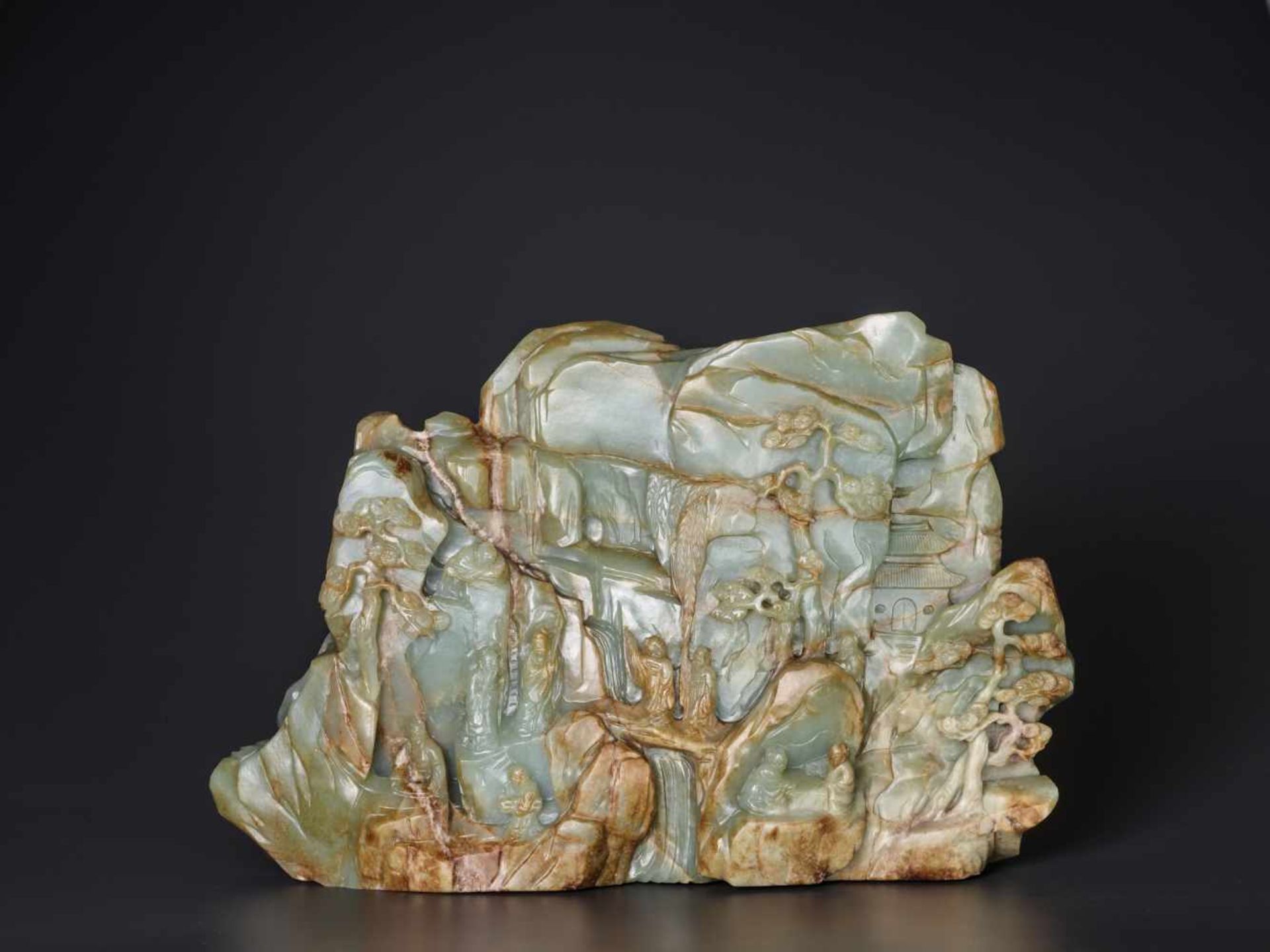 A SUPERB AND VERY LARGE CELADON AND RUSSET ‘SEVEN IMMORTALS’ JADE MOUNTAIN, 17th – 18th CENTURY