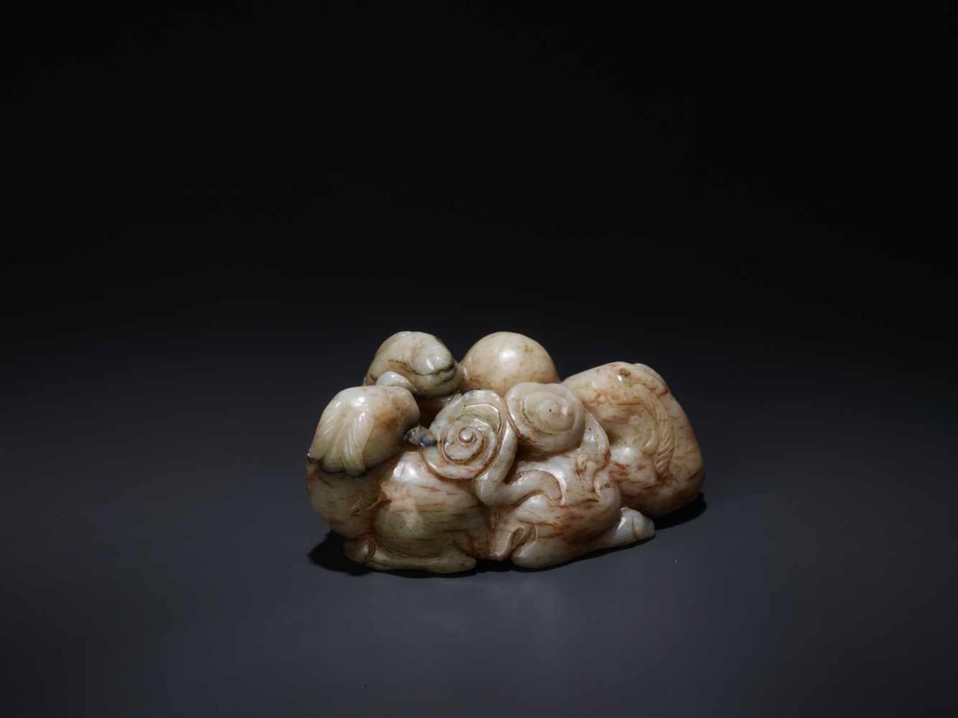 A CHICKEN BONE ‘SAN YANG’ THREE RAMS JADE GROUP, 17TH CENTURY The greyish-white nephrite suffused - Image 5 of 8