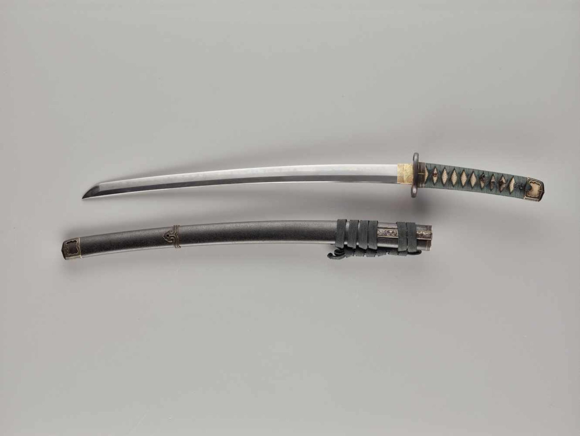 A WAKIZASHI BY KATSUYOSHI Japan, c. 17th century (blade); Edo period (1603 – 1868) (koshirae)