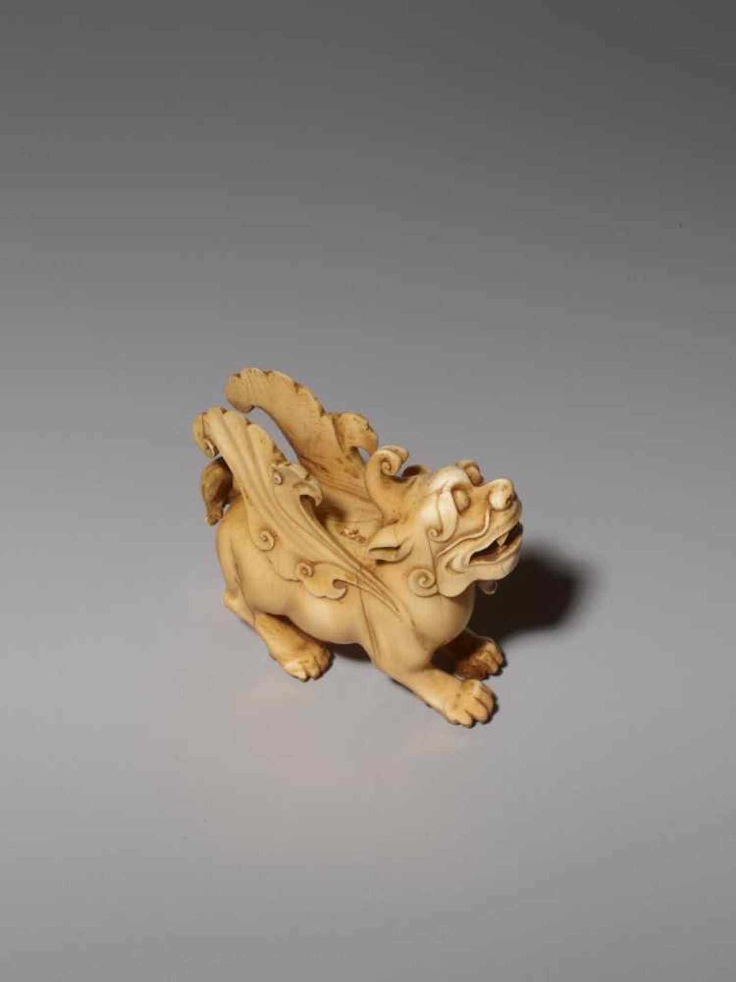 AN IVORY CARVING OF A MYTHICAL BEAST, BIXIE, QING DYNASTY Carved and incised elephant ivory with a - Image 8 of 9
