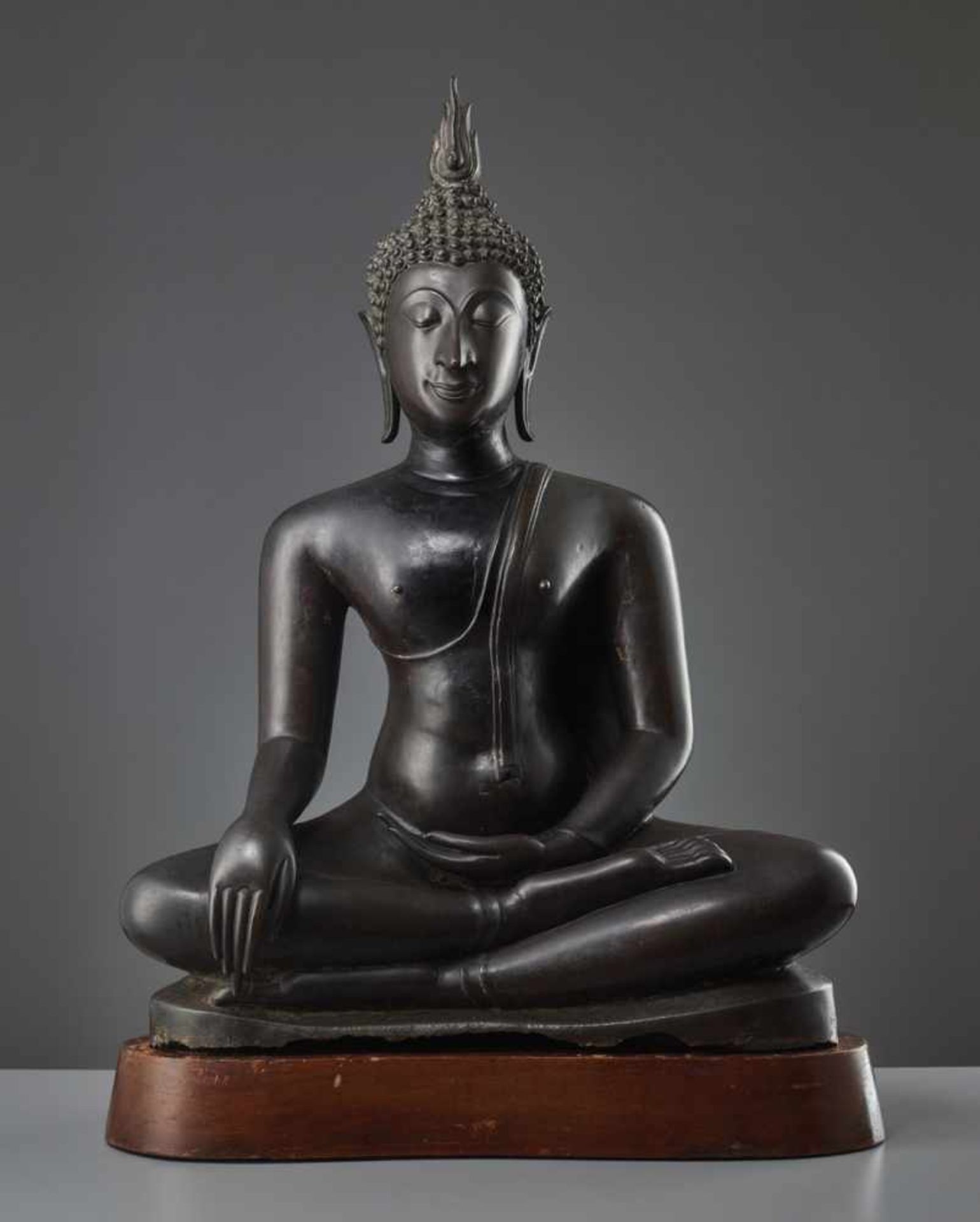 A LARGE AND IMPORTANT BRONZE FIGURE OF BUDDHA SHAKYAMUNI, SUKHOTHAI STYLE, KAMPHAENG PHET, 14TH –