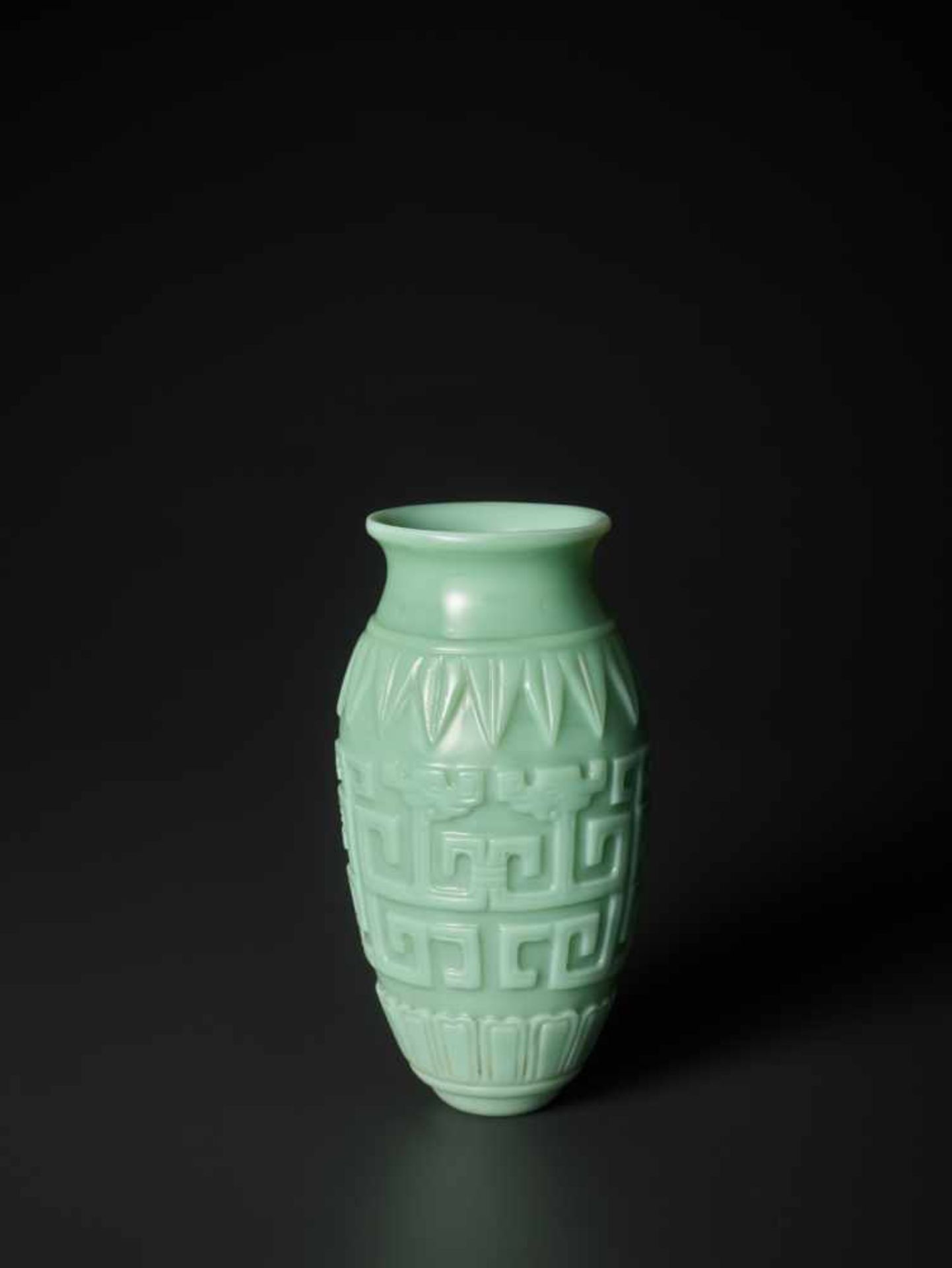 A RARE CARVED ARCHAISTIC ‘KUILONG’ TURQUOISE GLASS VASE, MID QING DYNASTY The translucent glass body - Image 6 of 9