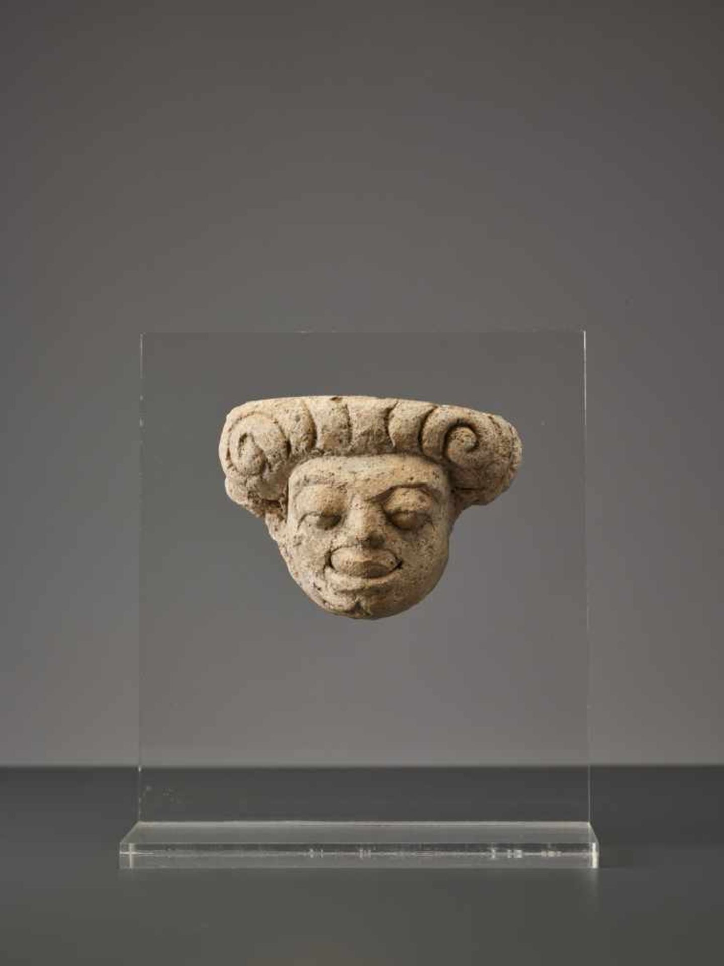 A MON-DVARAVATI STUCCO MASK OF A GROTESQUE MAN, 8th / 9th CENTURY Stucco, firmly mounted to modern - Image 3 of 5