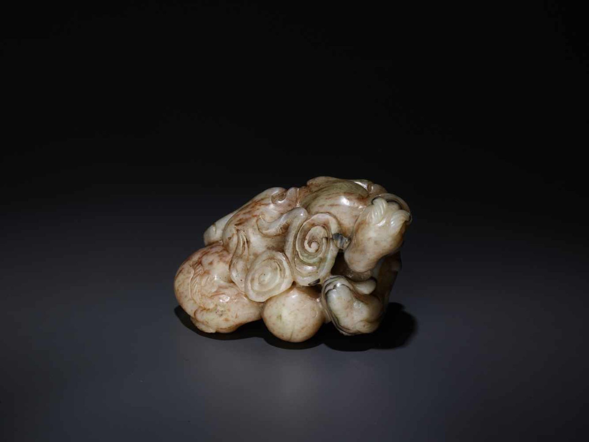 A CHICKEN BONE ‘SAN YANG’ THREE RAMS JADE GROUP, 17TH CENTURY The greyish-white nephrite suffused - Image 7 of 8