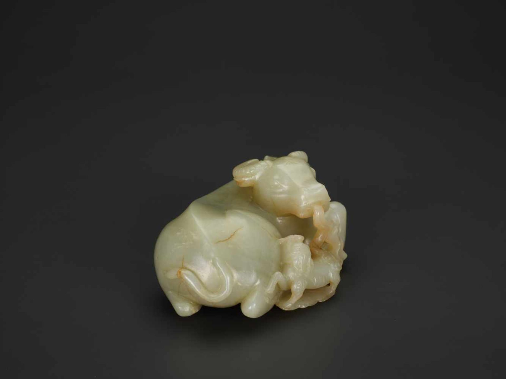 A PALE CELADON JADE 'BUFFALO AND QILIN' GROUP, QIANLONG PERIOD (1736-1795) The pale celadon nephrite - Image 6 of 7