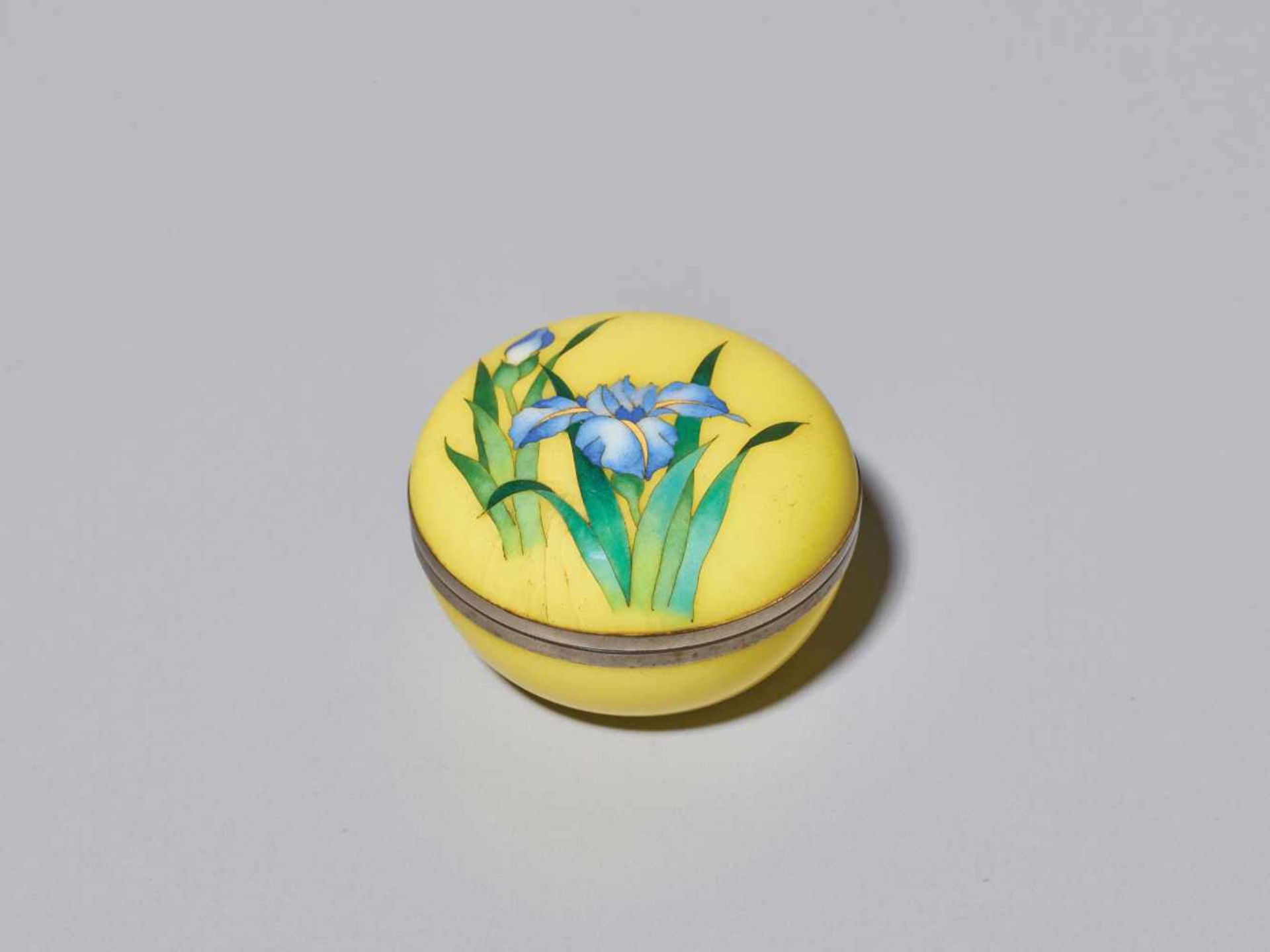 A JAPANESE CLOISONNÉ ENAMEL CIRCULAR BOX AND COVER WITH IRIS BLOSSOMS Cloisonné with colored