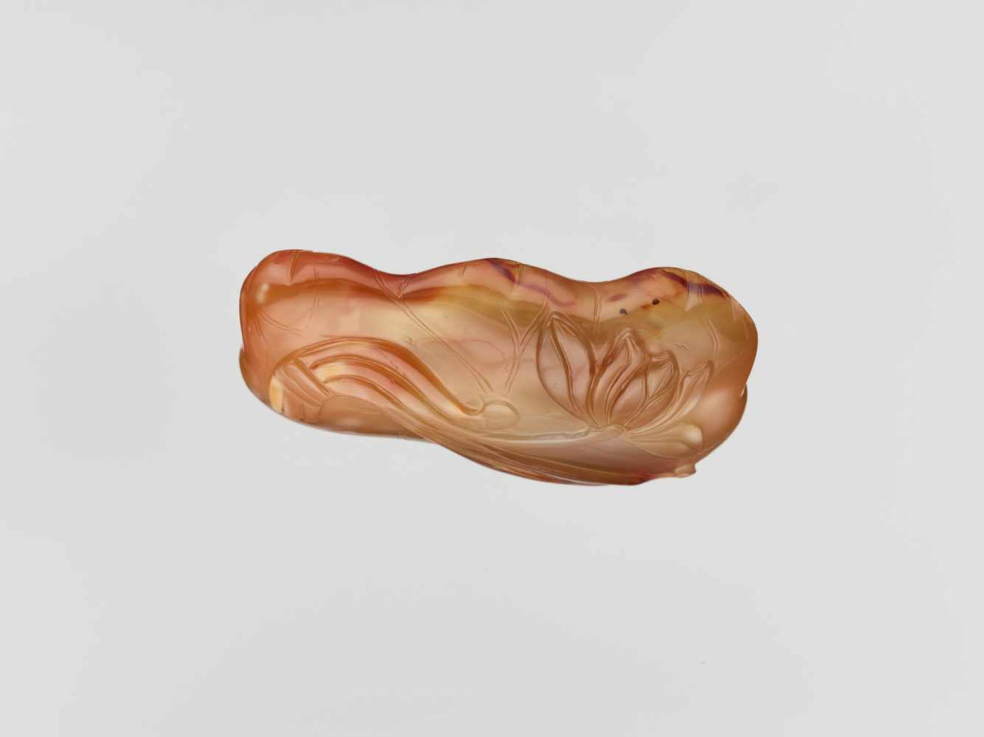 A CARVED AGATE ‘LOTUS’ WASHER QING DYNASTY, 18TH CENTURY Translucent agate of golden-brown and amber - Image 6 of 6