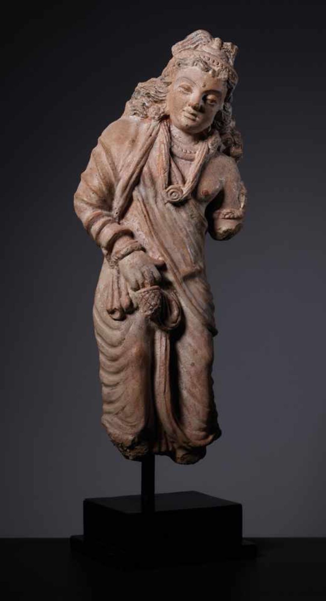 A GANDHARA TERRACOTTA STATUE OF A BODHISATTVA WITH MAGINIFICENT CURLS, 4th – 5TH CENTURY