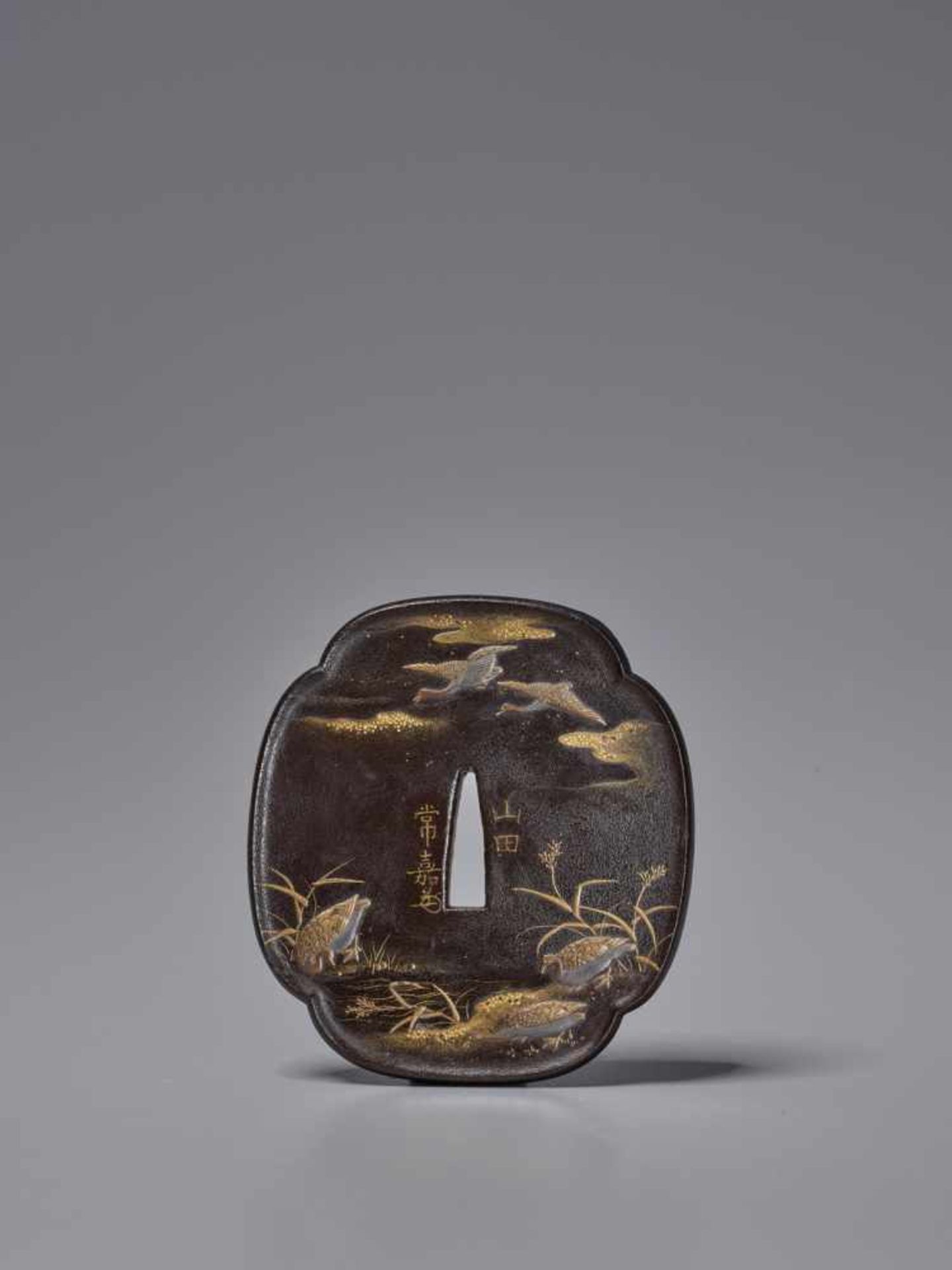 A RARE LACQUERED TSUBA WITH FULL MOON AND GEESE BY YAMADA TSUNEYOSHI Lacquered woodJapan, Edo period