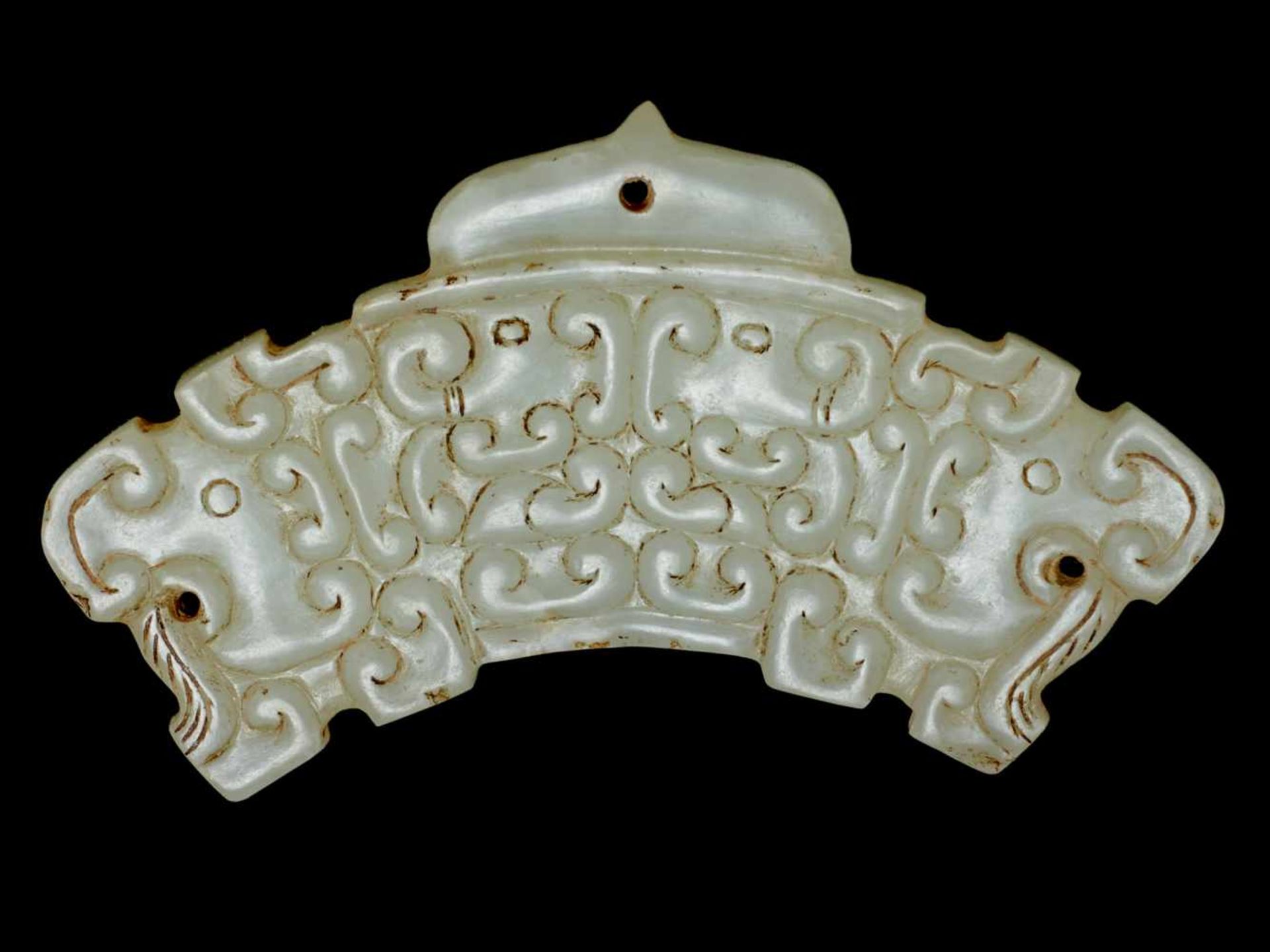 HUANG WITH DRAGON HEADS AND PATTERN OF CLOUD-SHAPED CURLS JUANYUN This jade is published in