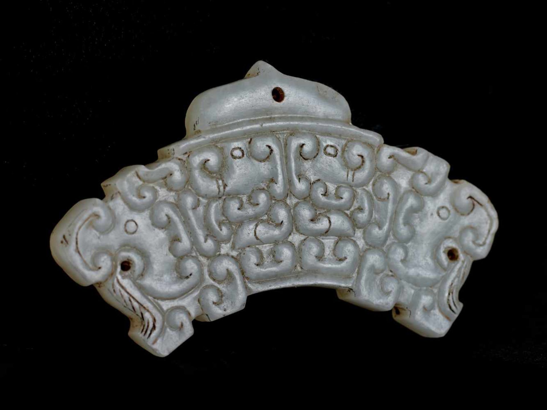 HUANG WITH DRAGON HEADS AND PATTERN OF CLOUD-SHAPED CURLS JUANYUN This jade is published in - Image 2 of 4