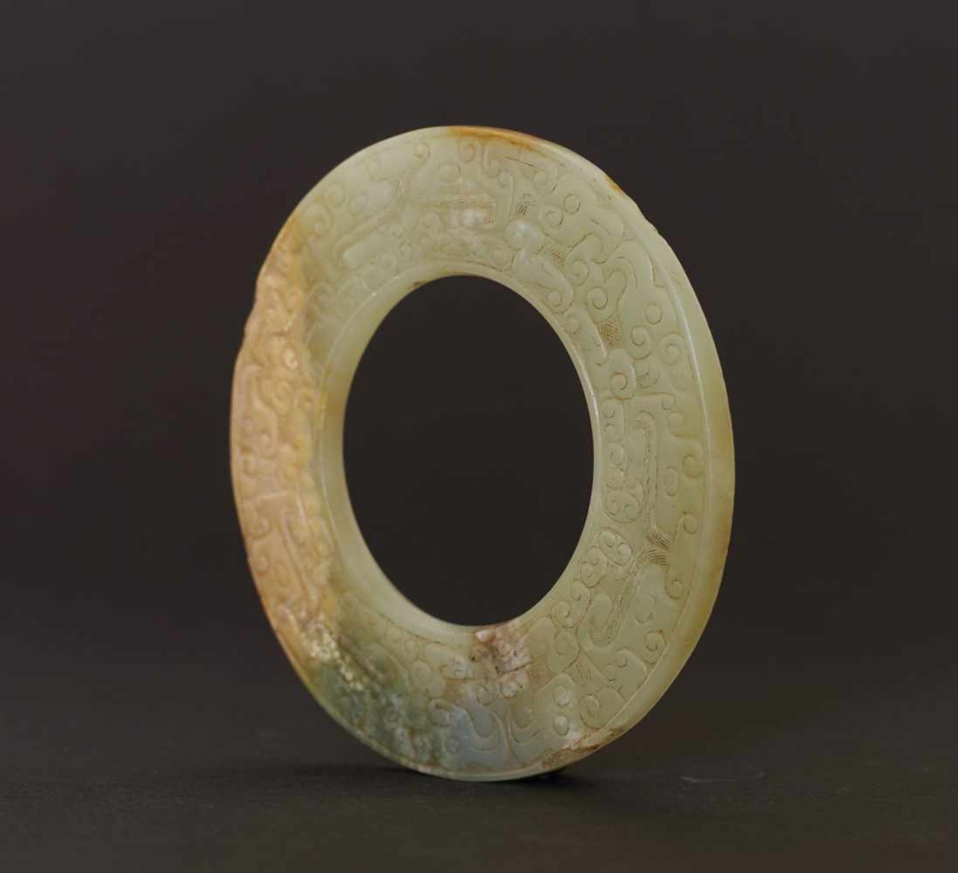 HUAN RING WITH ANIMAL MASKS AND BIRDS This jade is published in Filippo Salviati 4000 YEARS OF - Image 3 of 6