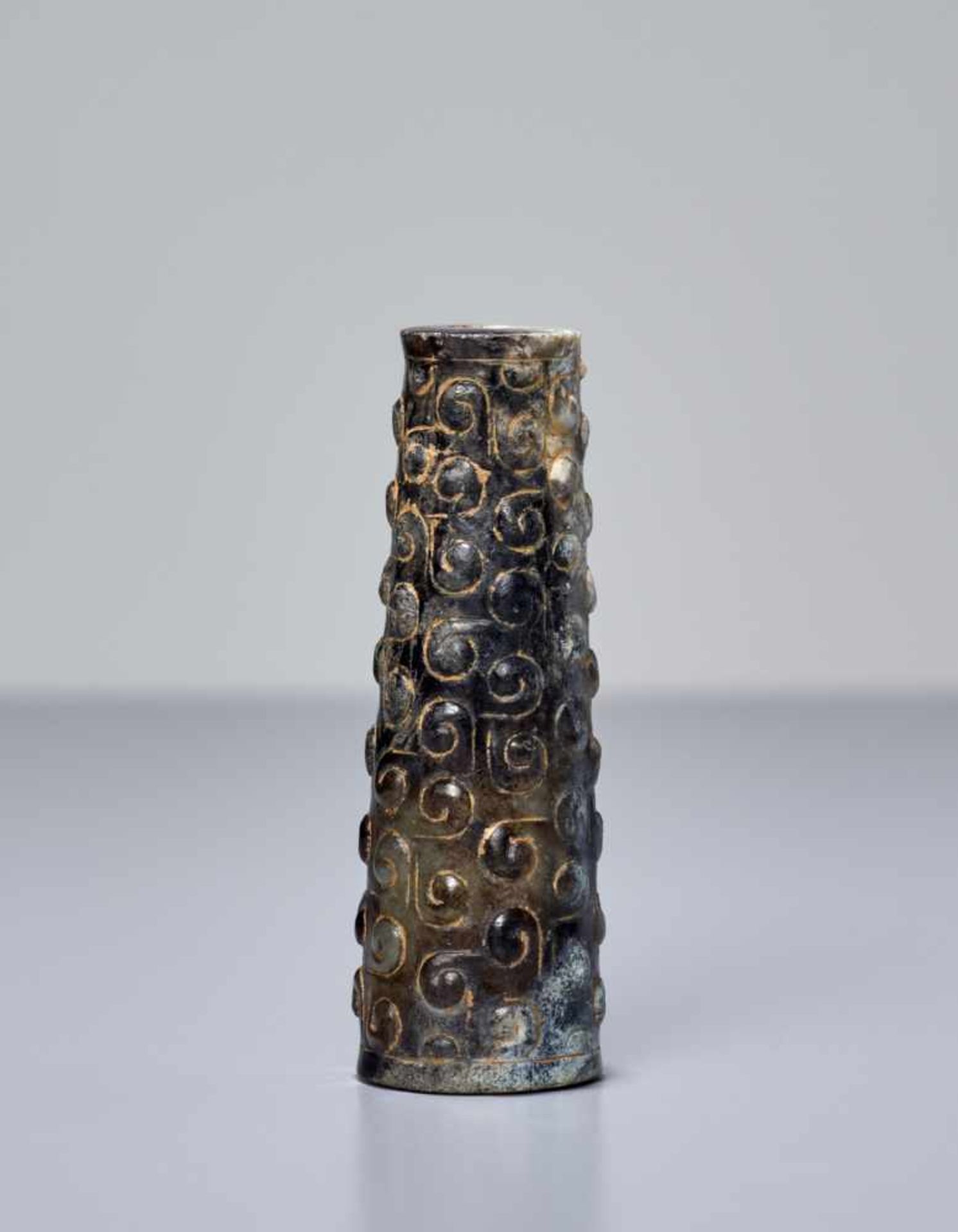 SMALL BEAD WITH PATTERN OF CURLS This jade is published in Filippo Salviati 4000 YEARS OF CHINESE