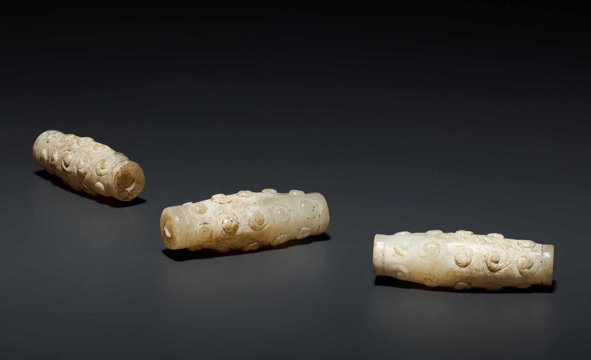 THREE BEADS WITH PATTERN OF RAISED CURLS This jade is published in Filippo Salviati 4000 YEARS OF - Image 2 of 4