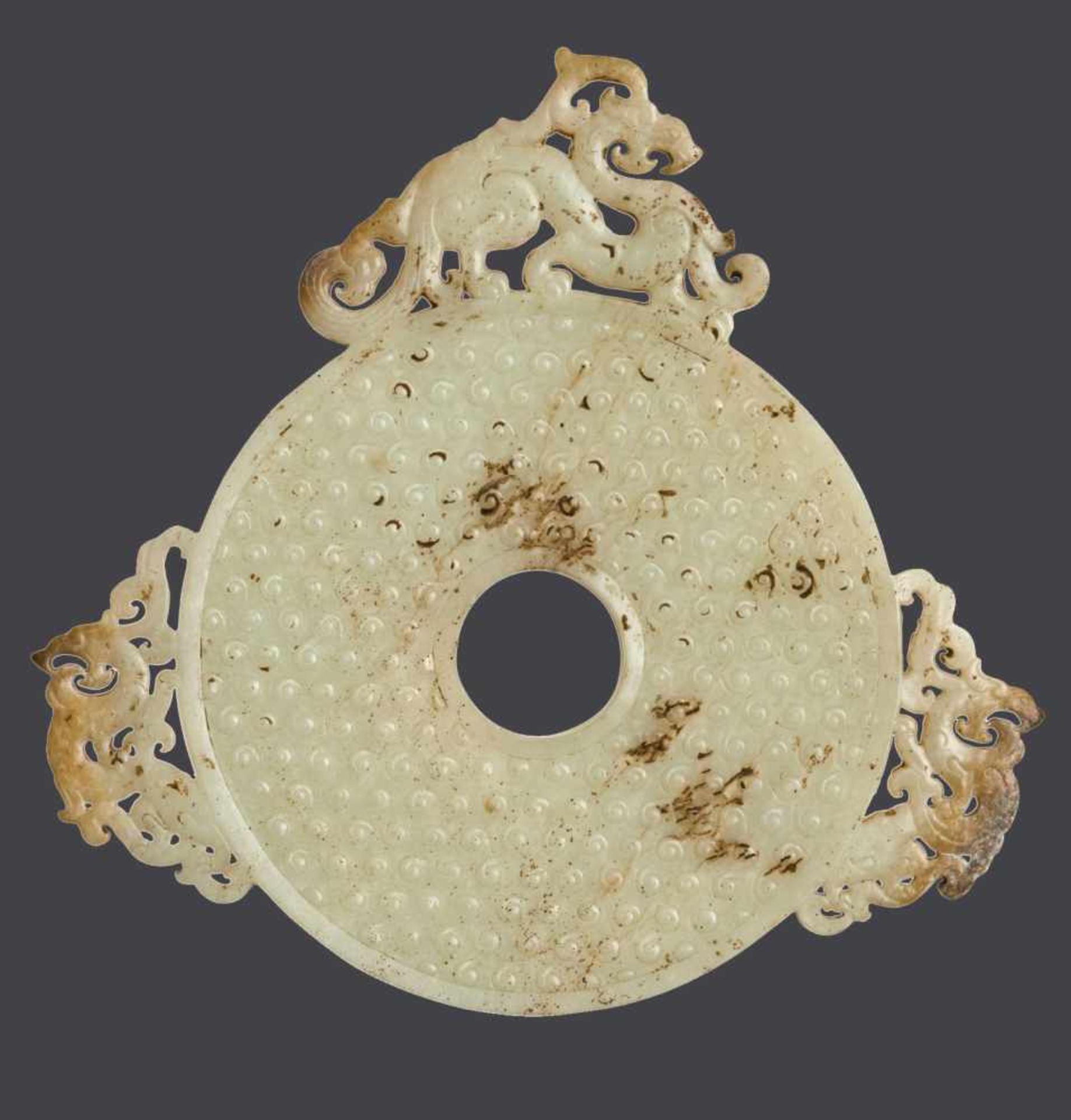BI DISC WITH DRAGONS AND RAISED CURLS This jade is published in Filippo Salviati 4000 YEARS OF