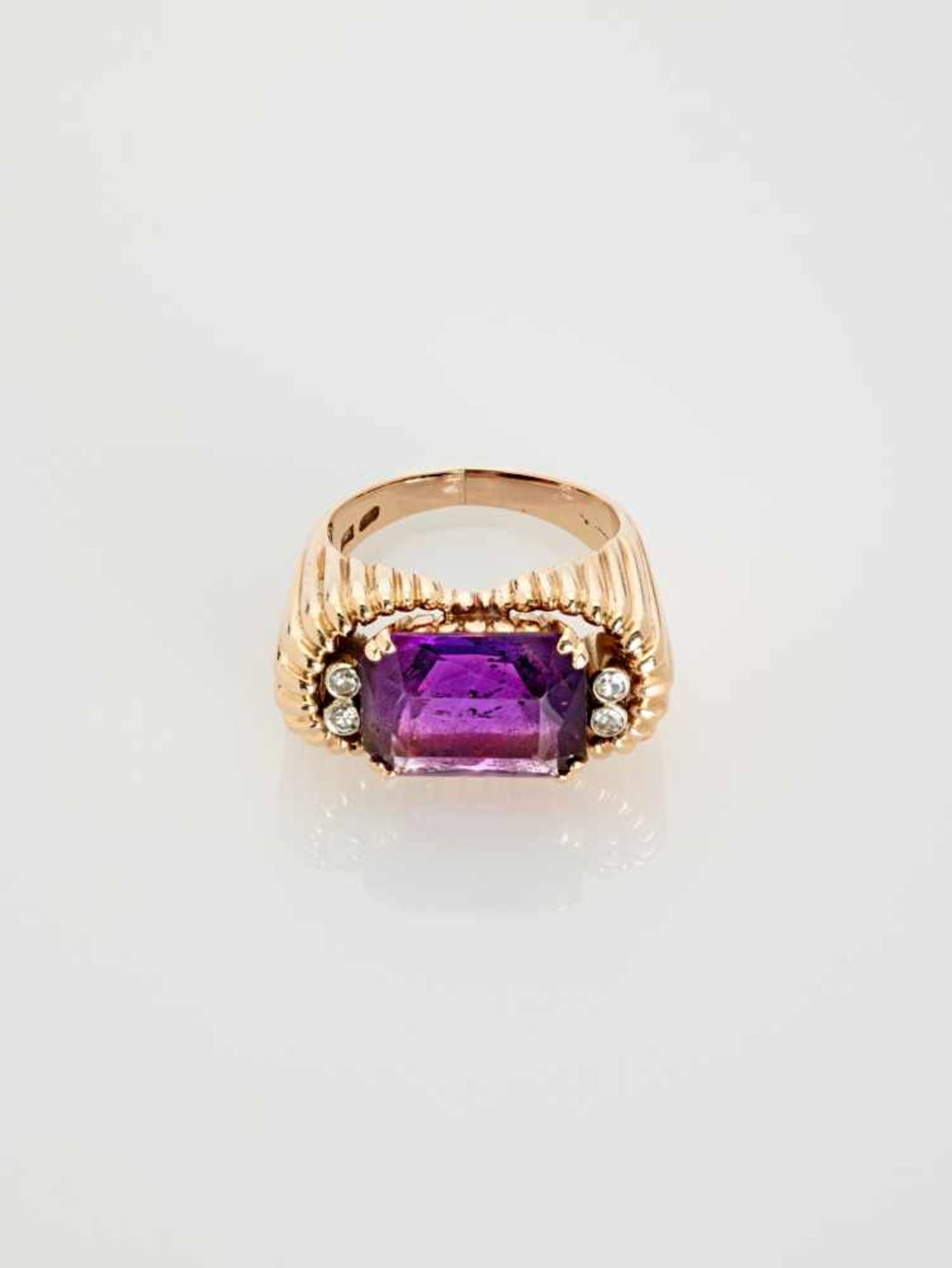 A DEEP PURPLE AMETHYST AND DIAMOND 14 CARAT PINK GOLD RINGAustriaAttributed to Erwin Paltscho, after - Image 3 of 7