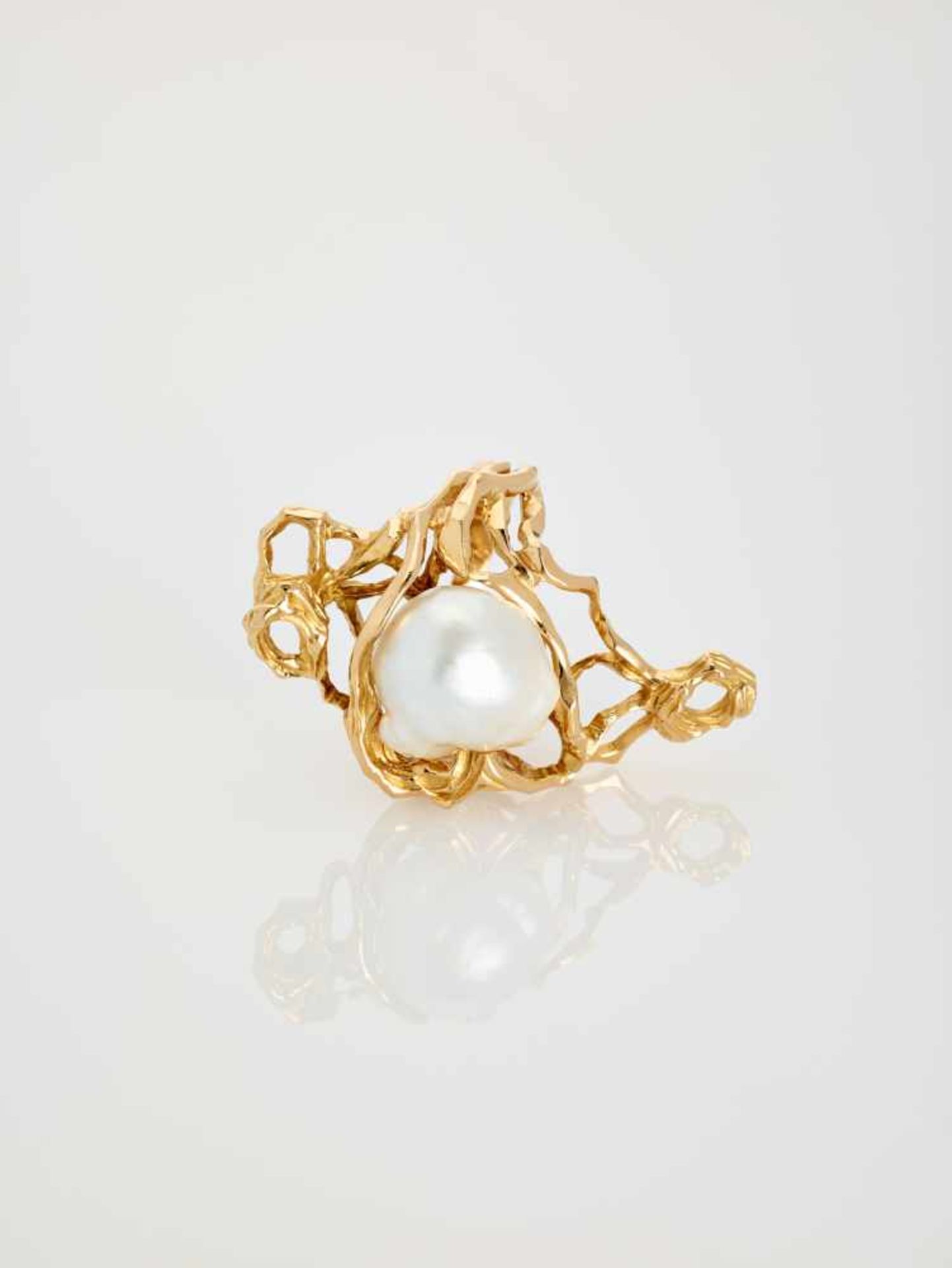 A GÜBELIN 18 CARAT GOLD RING WITH A 12 CARAT BAROQUE STYLE SOUTH-SEA PEARLSwitzerland1978, with