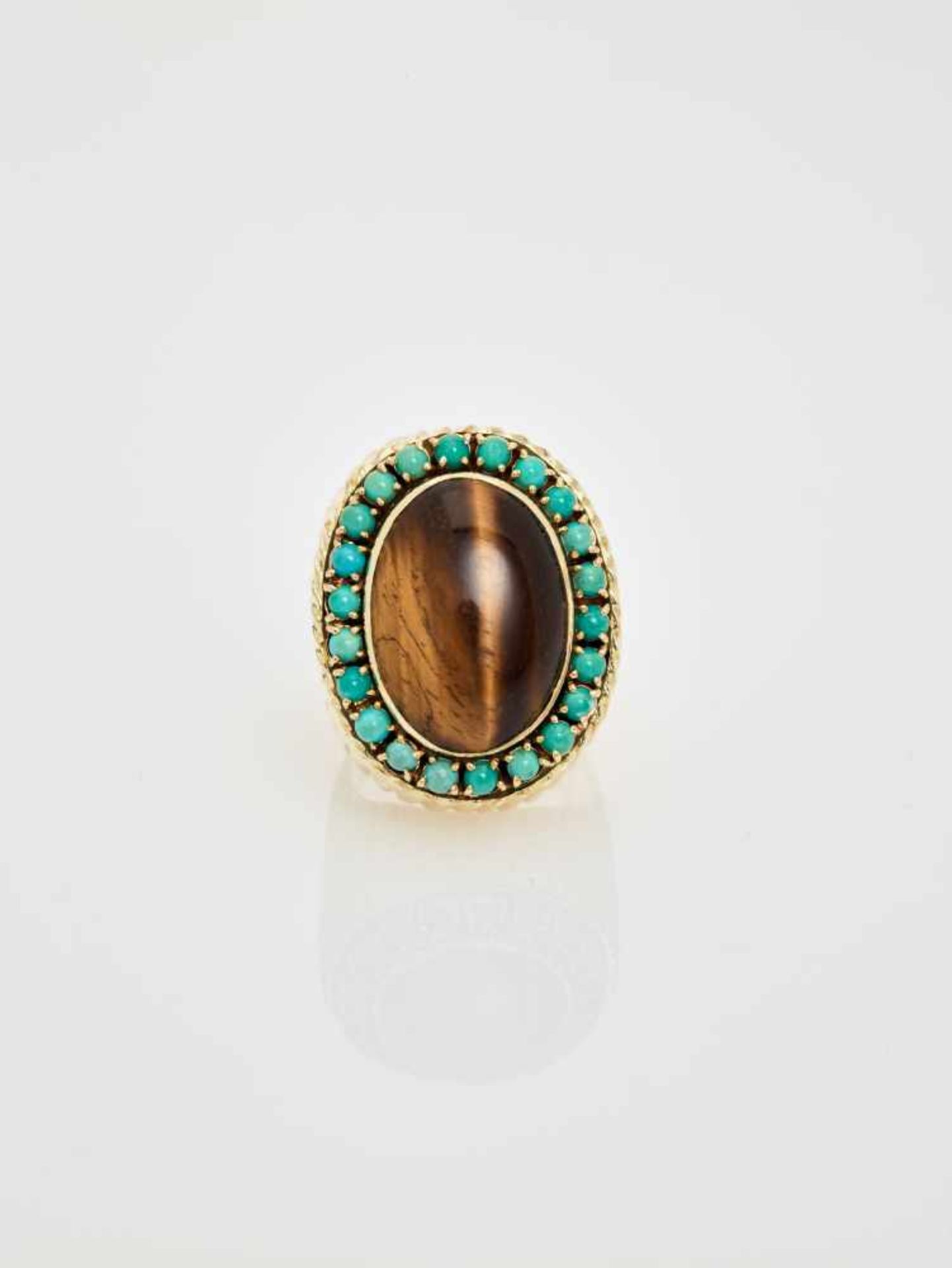 A TIGER’S EYE AND TURQUOISE 14 CARAT YELLOW GOLD COCKTAIL RINGAustriaAttributed to Erwin Paltscho, - Image 2 of 7