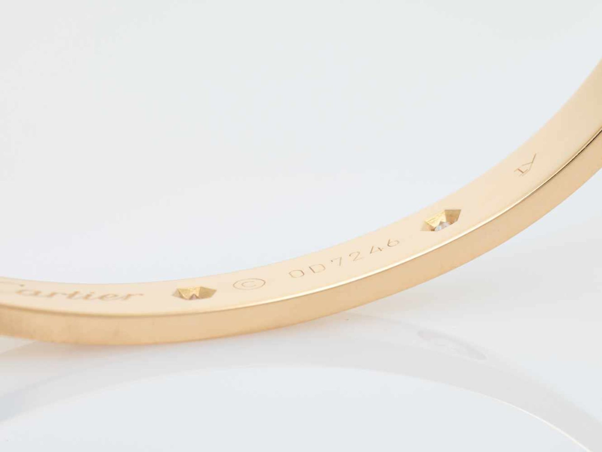 A CARTIER 18 CARAT GOLD ‘LOVE’ BANGLE WITH 1.2 CARATS OF DIAMONDSFrance2007, signed ‘Cartier’, - Image 8 of 9