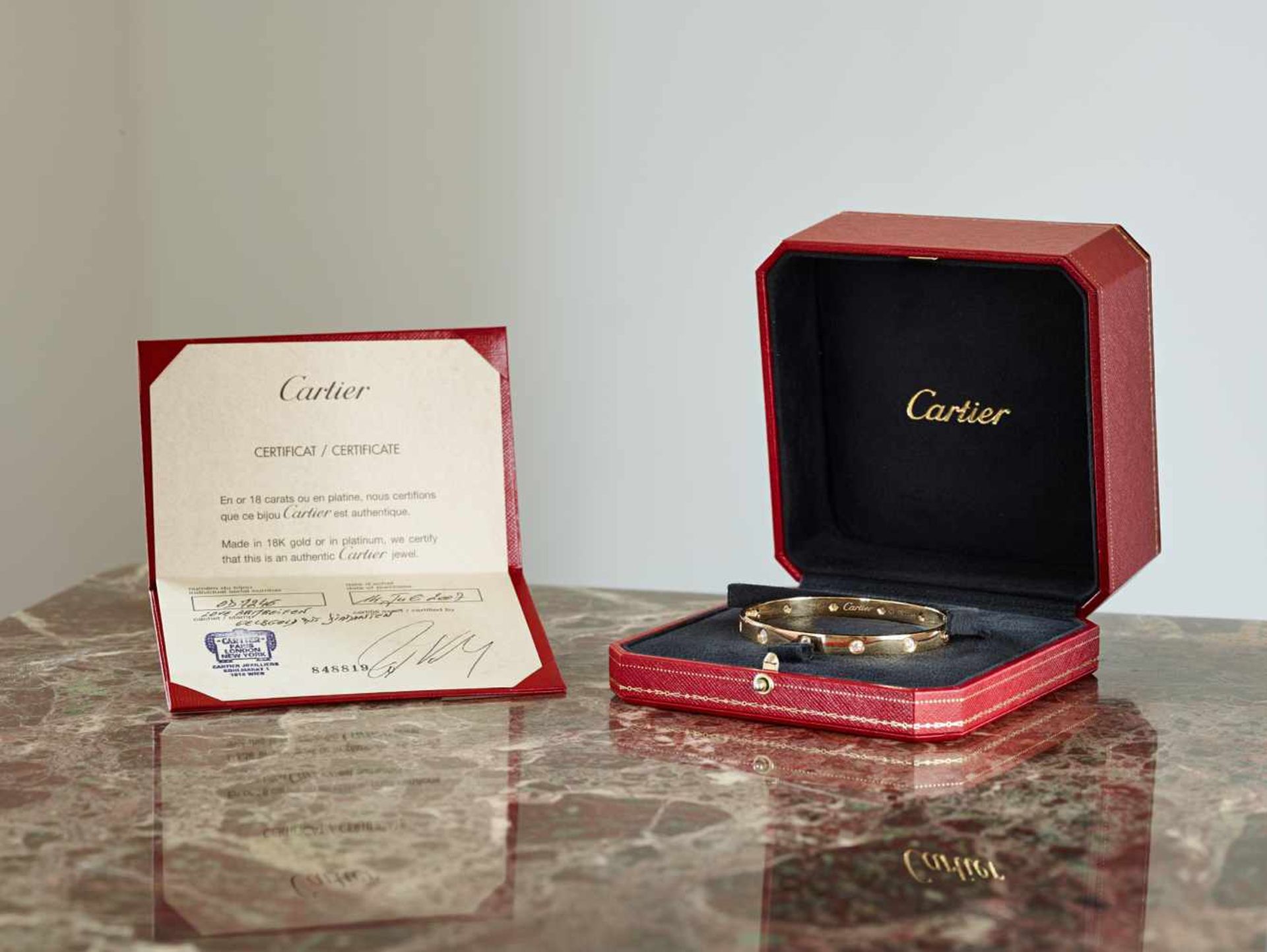 A CARTIER 18 CARAT GOLD ‘LOVE’ BANGLE WITH 1.2 CARATS OF DIAMONDSFrance2007, signed ‘Cartier’, - Image 3 of 9
