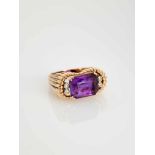 A DEEP PURPLE AMETHYST AND DIAMOND 14 CARAT PINK GOLD RINGAustriaAttributed to Erwin Paltscho, after