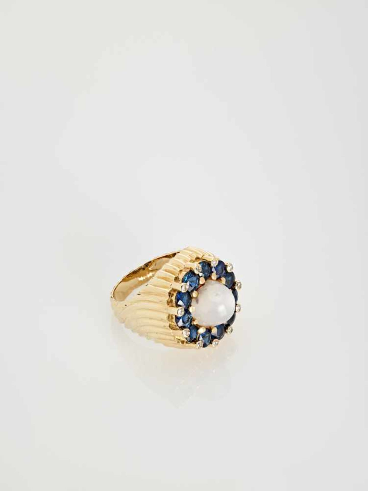 A SAPPHIRE, DIAMOND AND MOONSTONE YELLOW GOLD COCKTAIL RING BY PALTSCHOAustriaErwin Paltscho, - Image 6 of 7