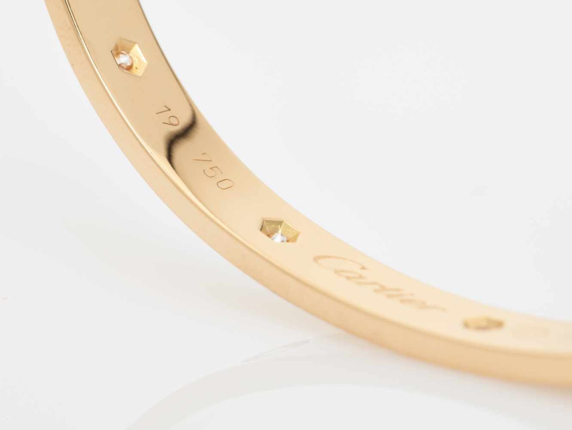 A CARTIER 18 CARAT GOLD ‘LOVE’ BANGLE WITH 1.2 CARATS OF DIAMONDSFrance2007, signed ‘Cartier’, - Image 7 of 9