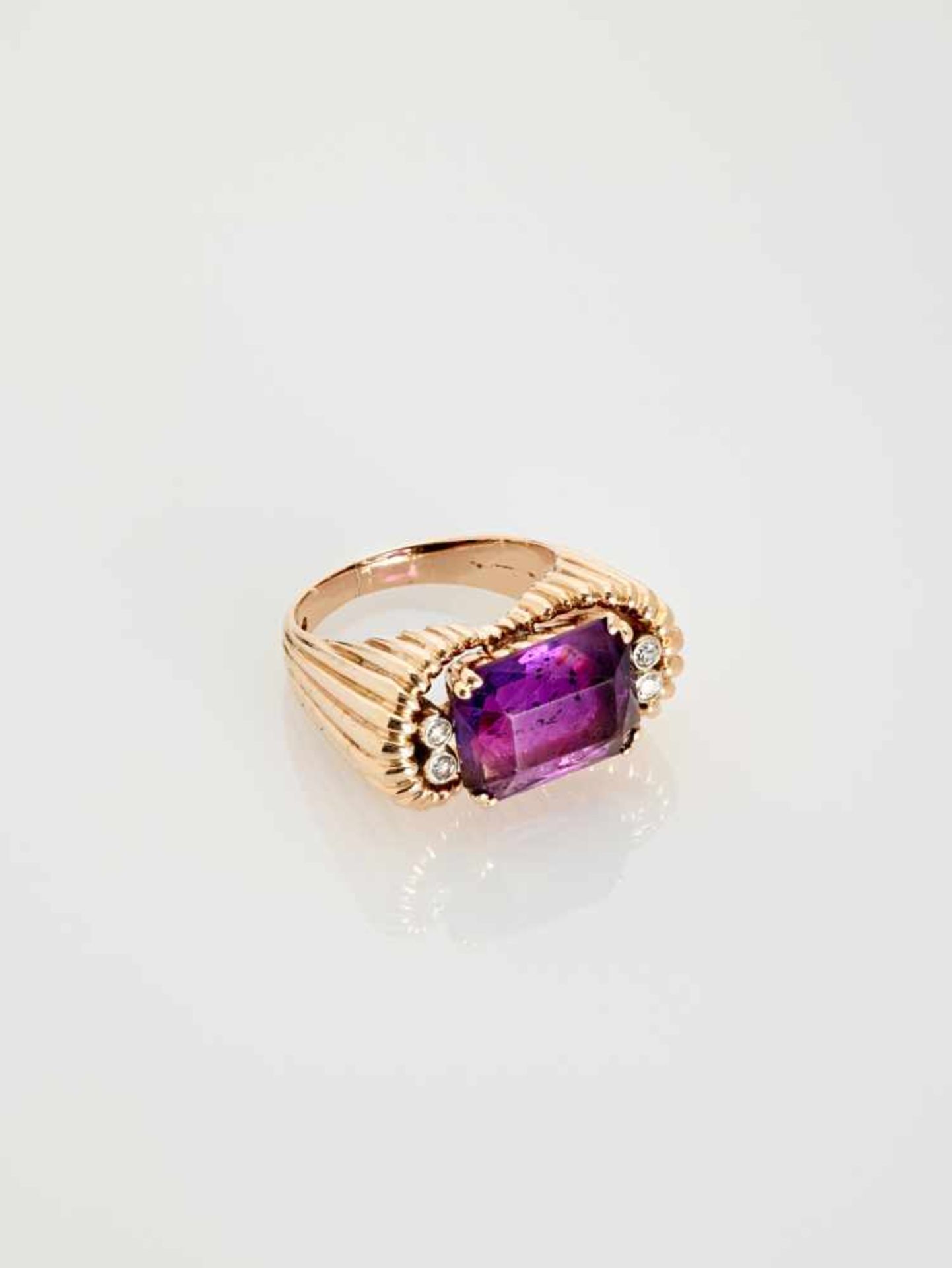 A DEEP PURPLE AMETHYST AND DIAMOND 14 CARAT PINK GOLD RINGAustriaAttributed to Erwin Paltscho, after - Image 7 of 7