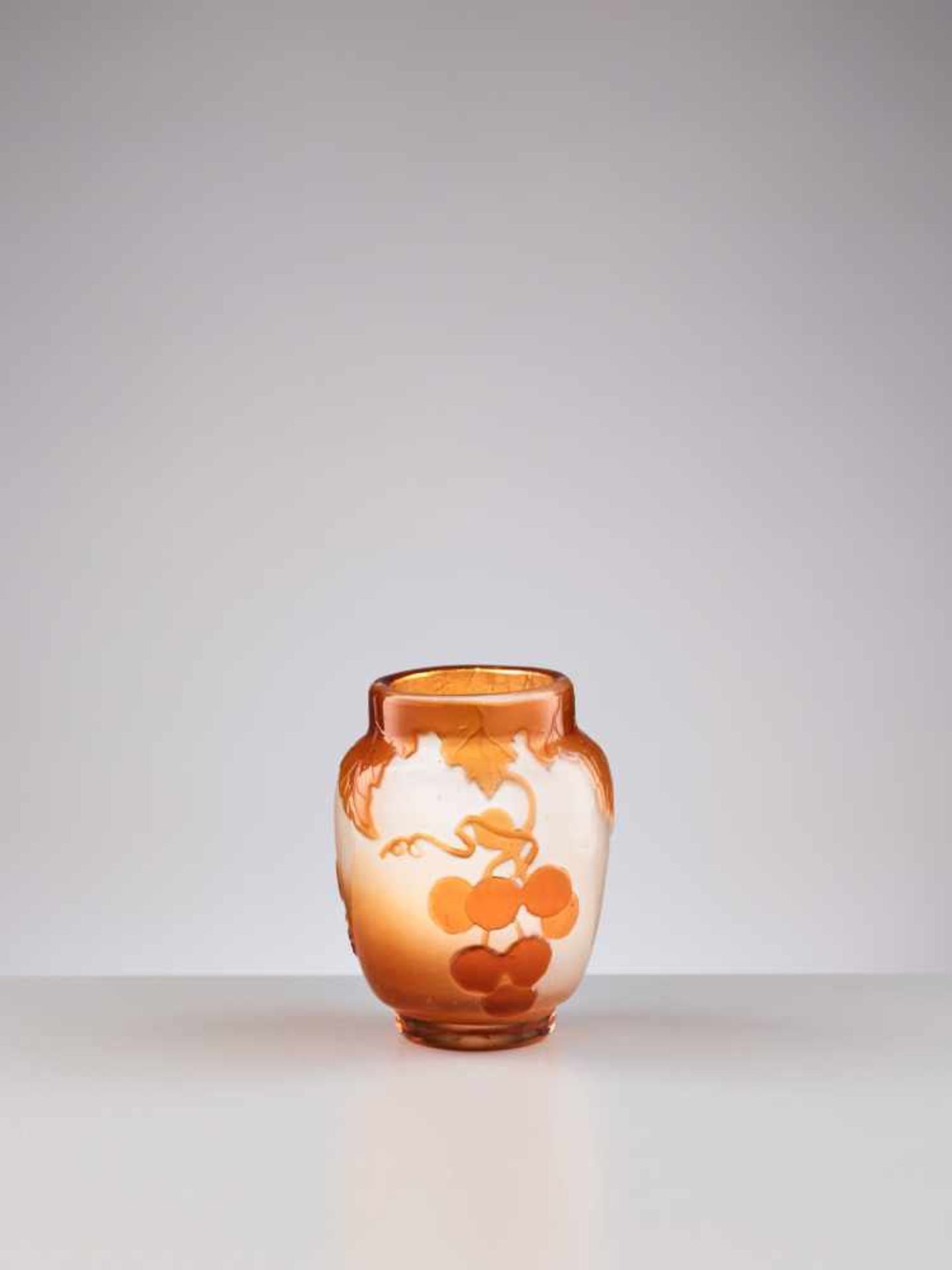 ÉMILE GALLÉ (1846-1904), FIRE-POLISHED CAMEO GLASS VASE WITH WINE GRAPESÉmile Gallé (1846-1904),