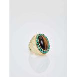 A TIGER’S EYE AND TURQUOISE 14 CARAT YELLOW GOLD COCKTAIL RINGAustriaAttributed to Erwin Paltscho,