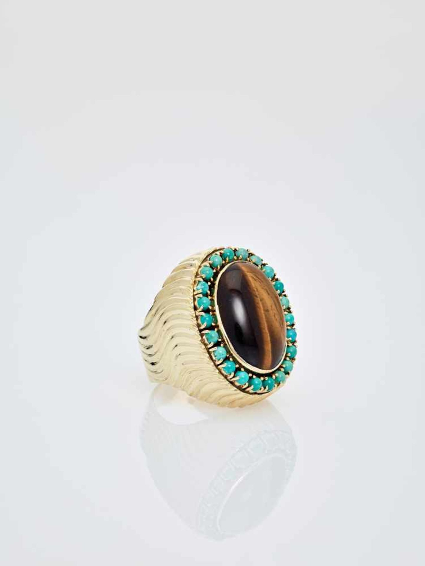 A TIGER’S EYE AND TURQUOISE 14 CARAT YELLOW GOLD COCKTAIL RINGAustriaAttributed to Erwin Paltscho,